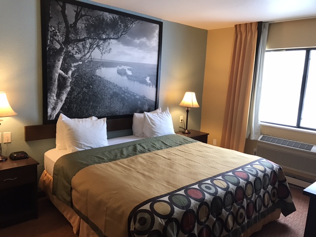 Guest room at the Super 8 by Wyndham Plover Stevens Point Area in Plover, Wisconsin