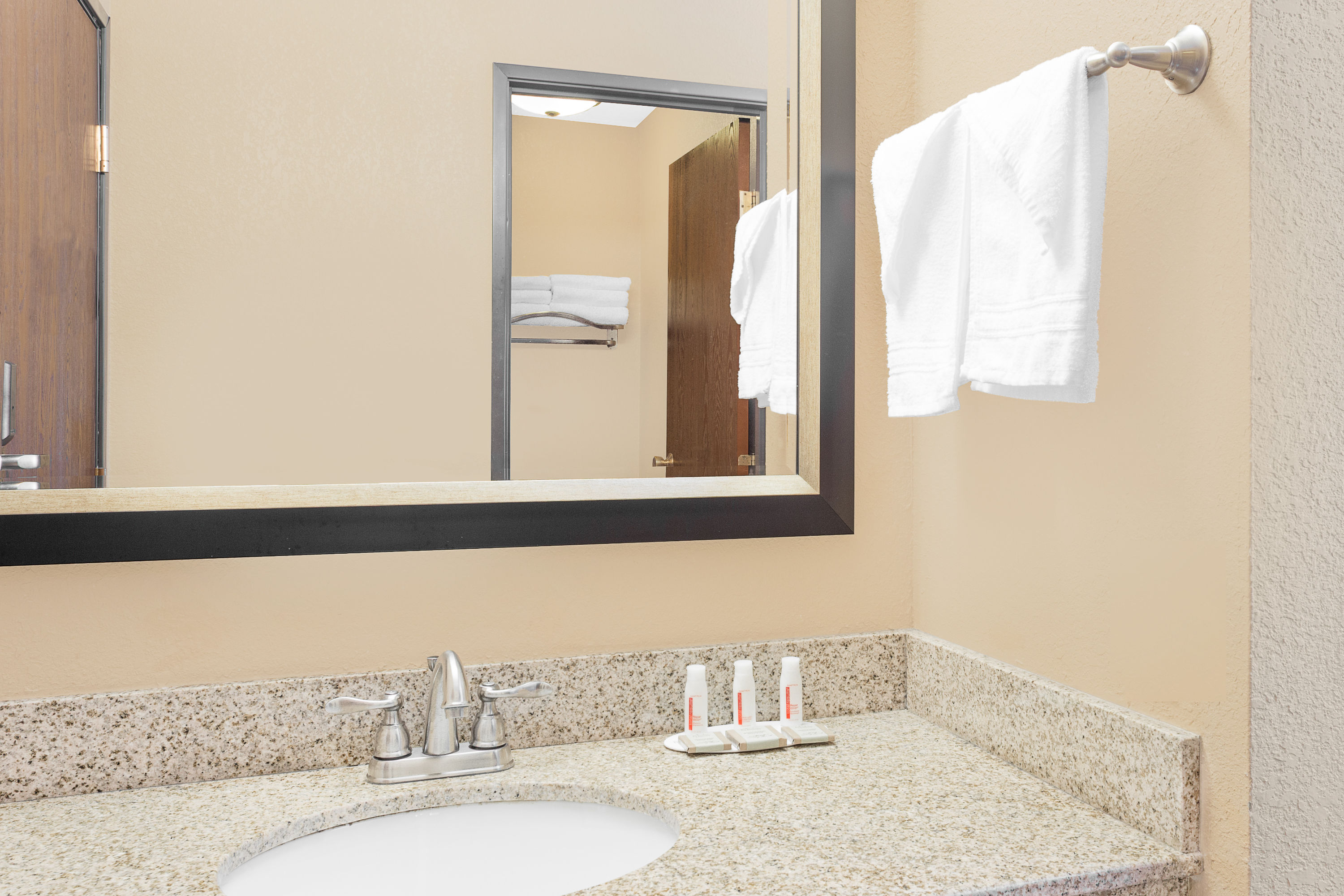 Guest room bath at the Super 8 by Wyndham Sheboygan WI in Sheboygan, Wisconsin