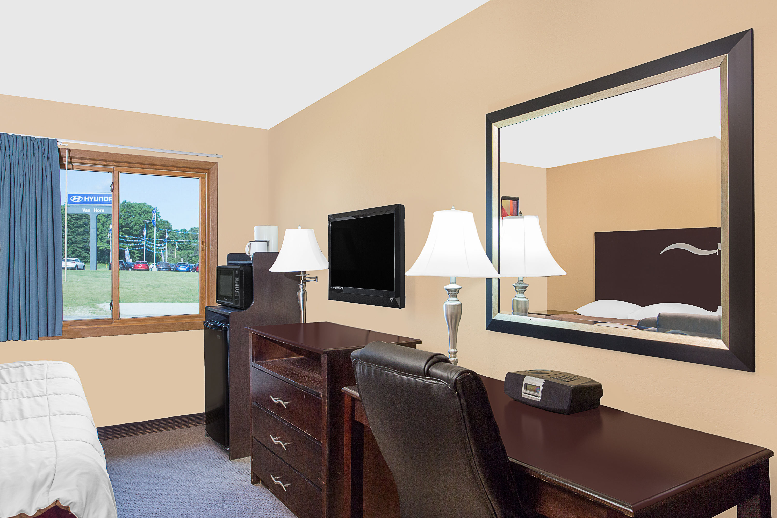 Guest room at the Super 8 by Wyndham Sheboygan WI in Sheboygan, Wisconsin
