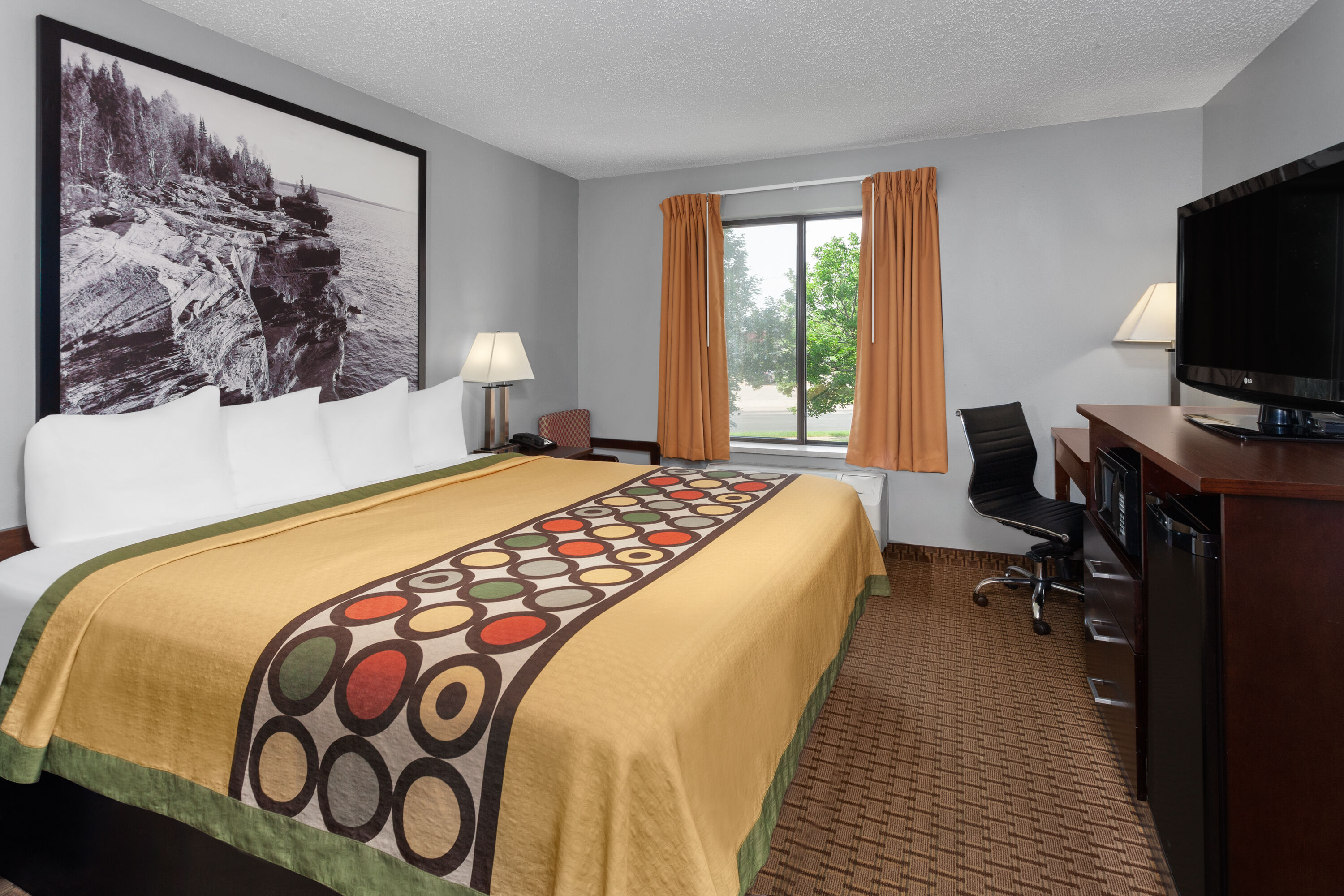 Guest room at the Super 8 by Wyndham Sun Prairie/Madison E in Sun Prairie, Wisconsin