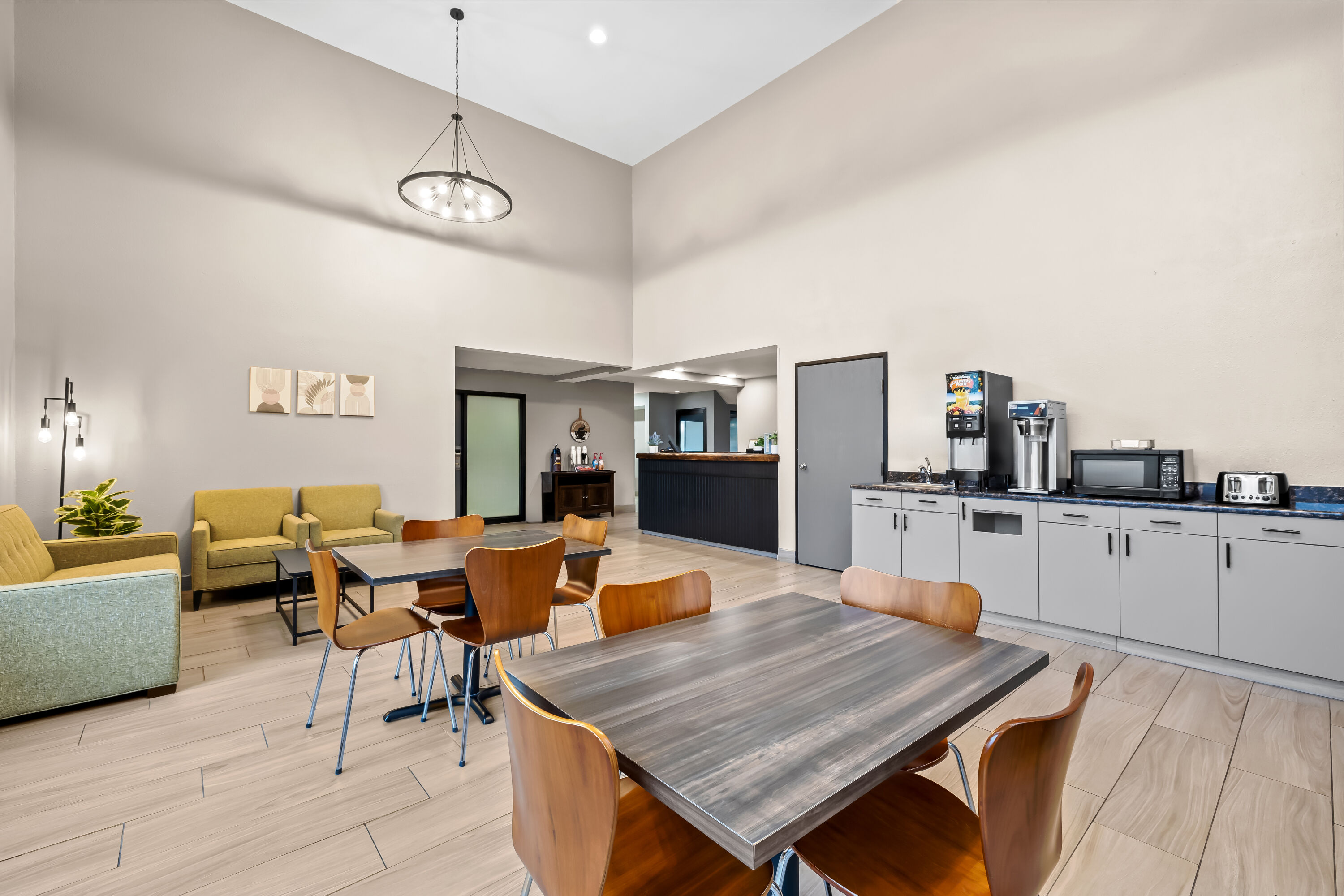 Super 8 by Wyndham Watertown WI restaurant breakfast area with seating in Watertown, Wisconsin