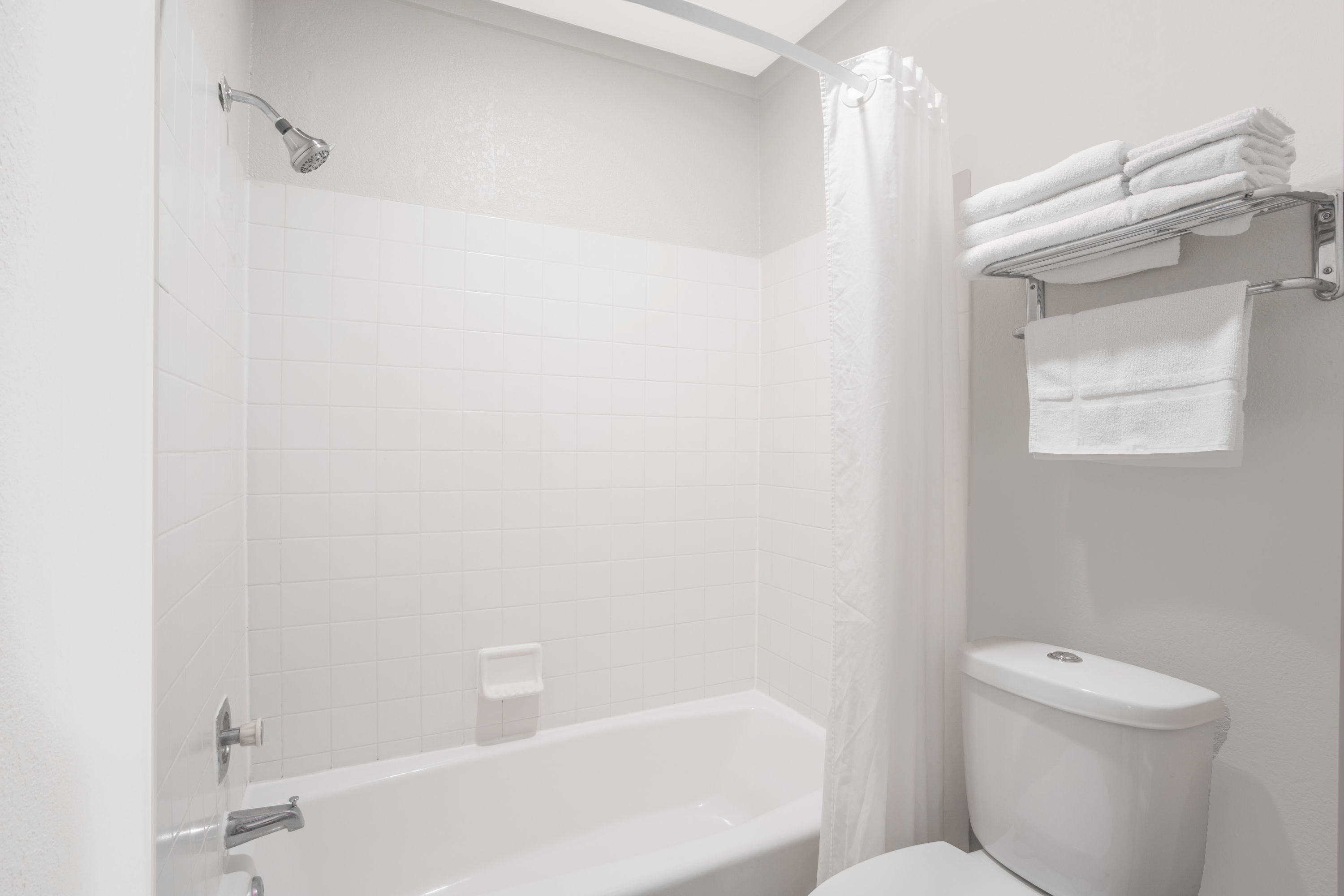 Guest room bath at the Super 8 by Wyndham Windsor/Madison North in Windsor, Wisconsin