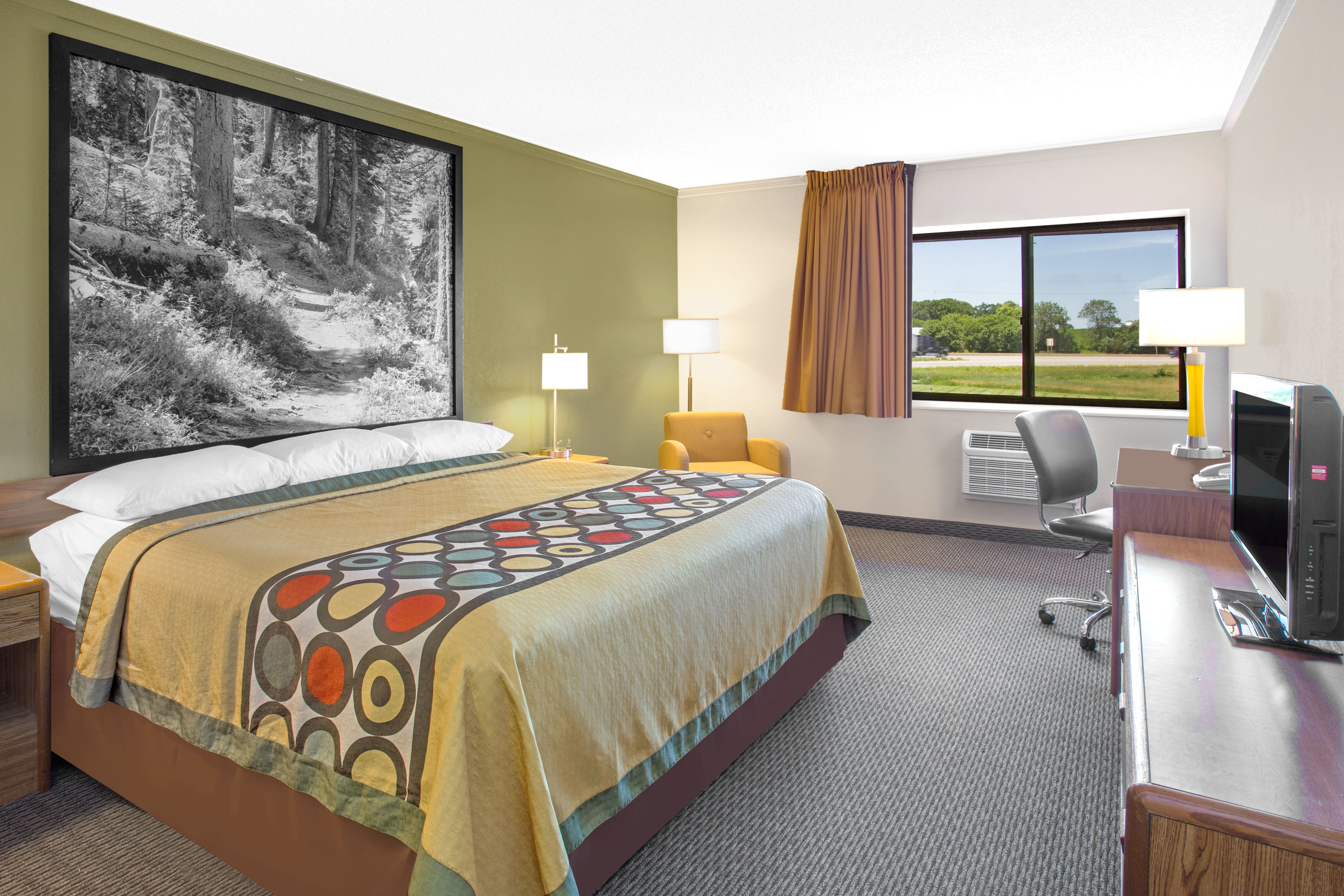 Guest room at the Super 8 by Wyndham Windsor/Madison North in Windsor, Wisconsin