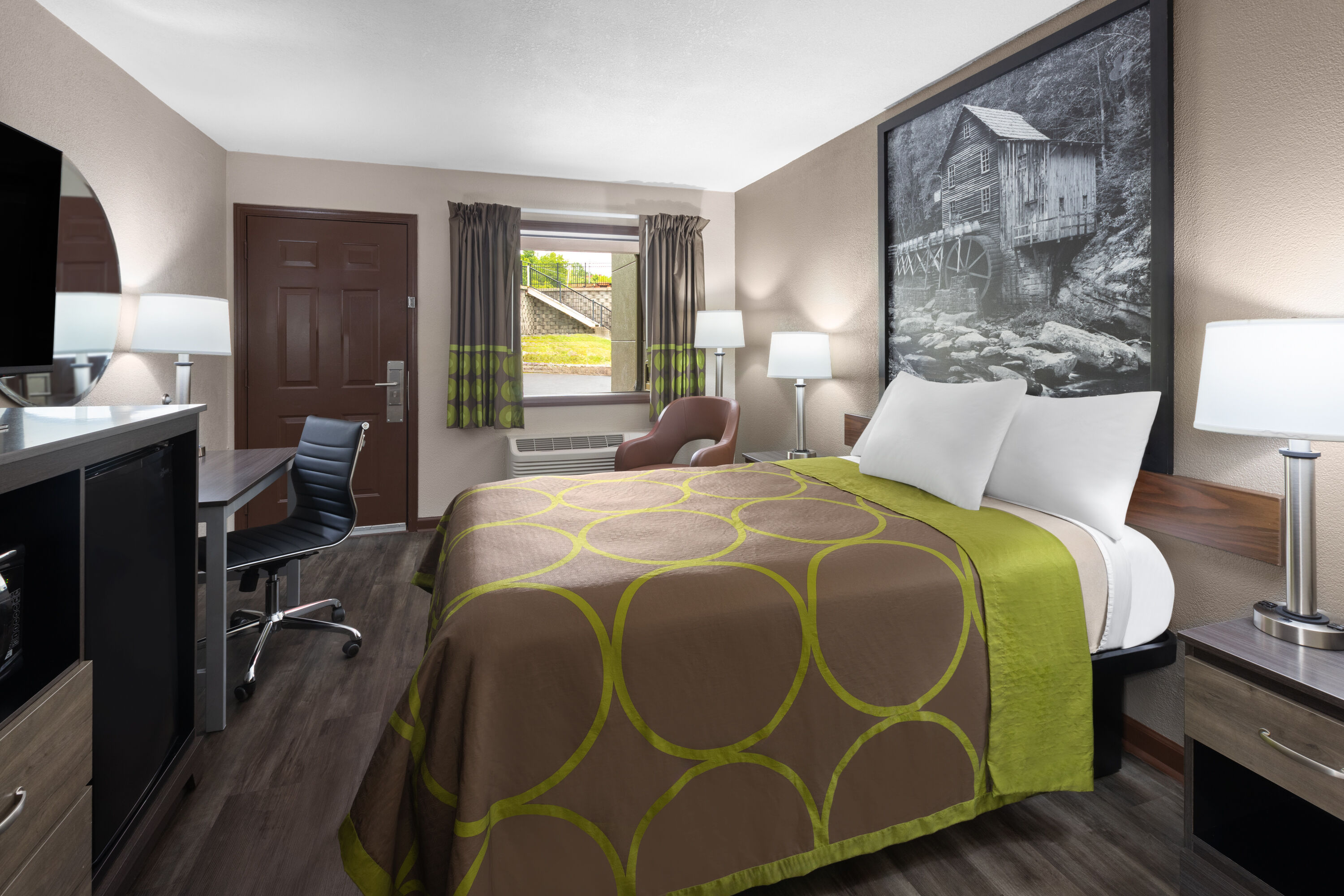 Guest room at the Super 8 by Wyndham Bridgeport/Clarksburg Area in Bridgeport, West Virginia