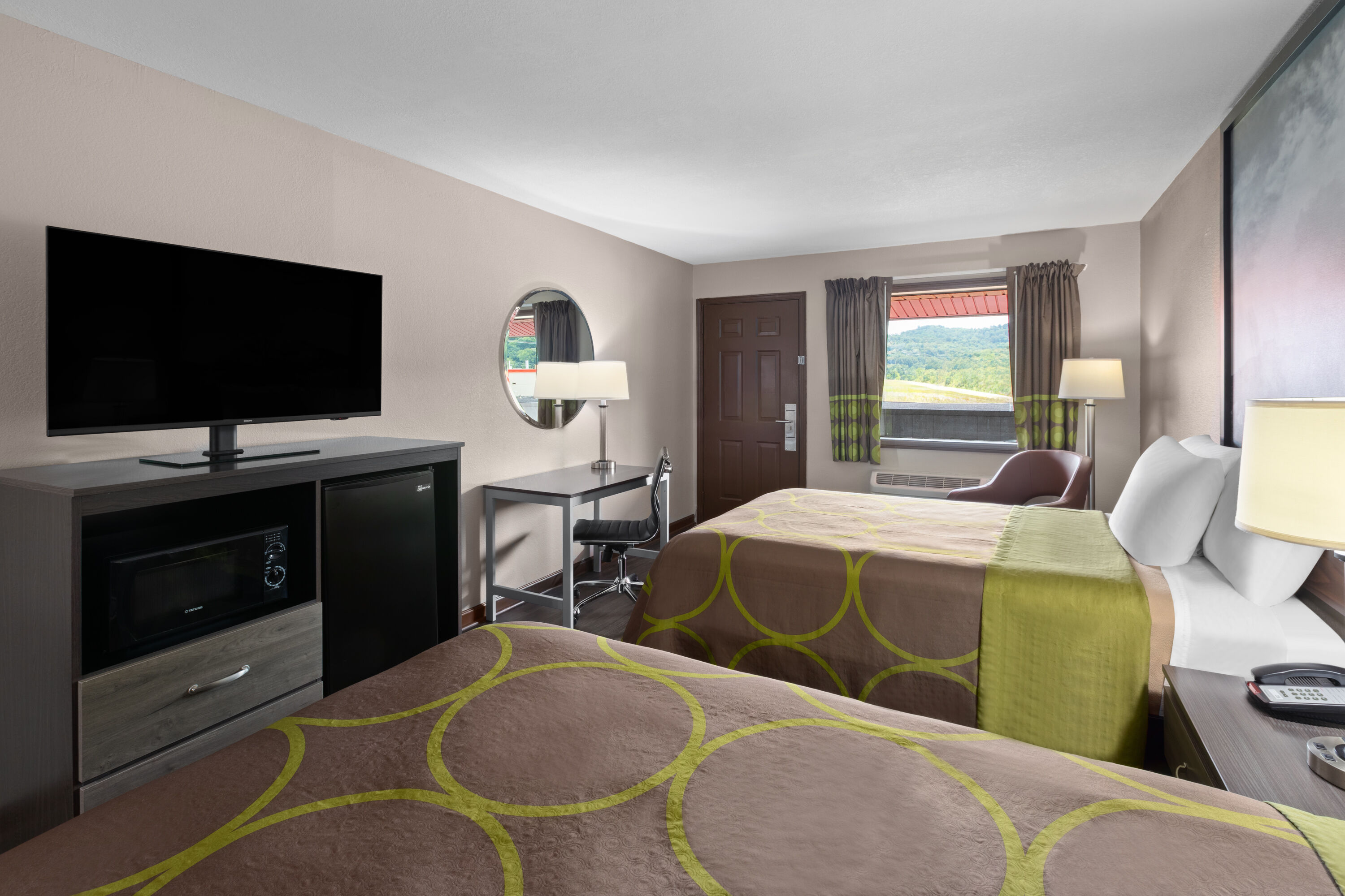 Guest room at the Super 8 by Wyndham Bridgeport/Clarksburg Area in Bridgeport, West Virginia