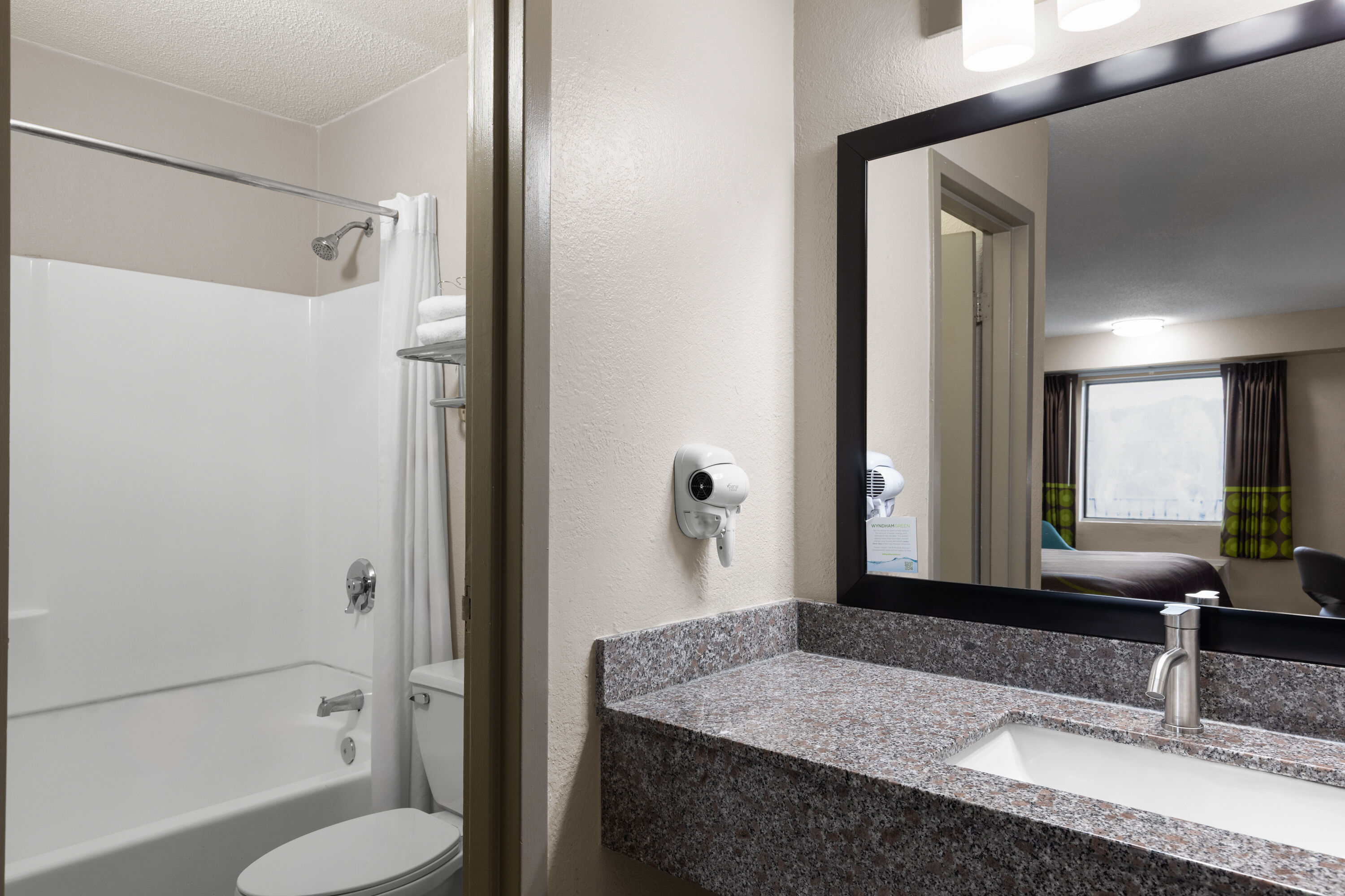 Guest room bath at the Super 8 by Wyndham Charleston WV in Charleston, West Virginia