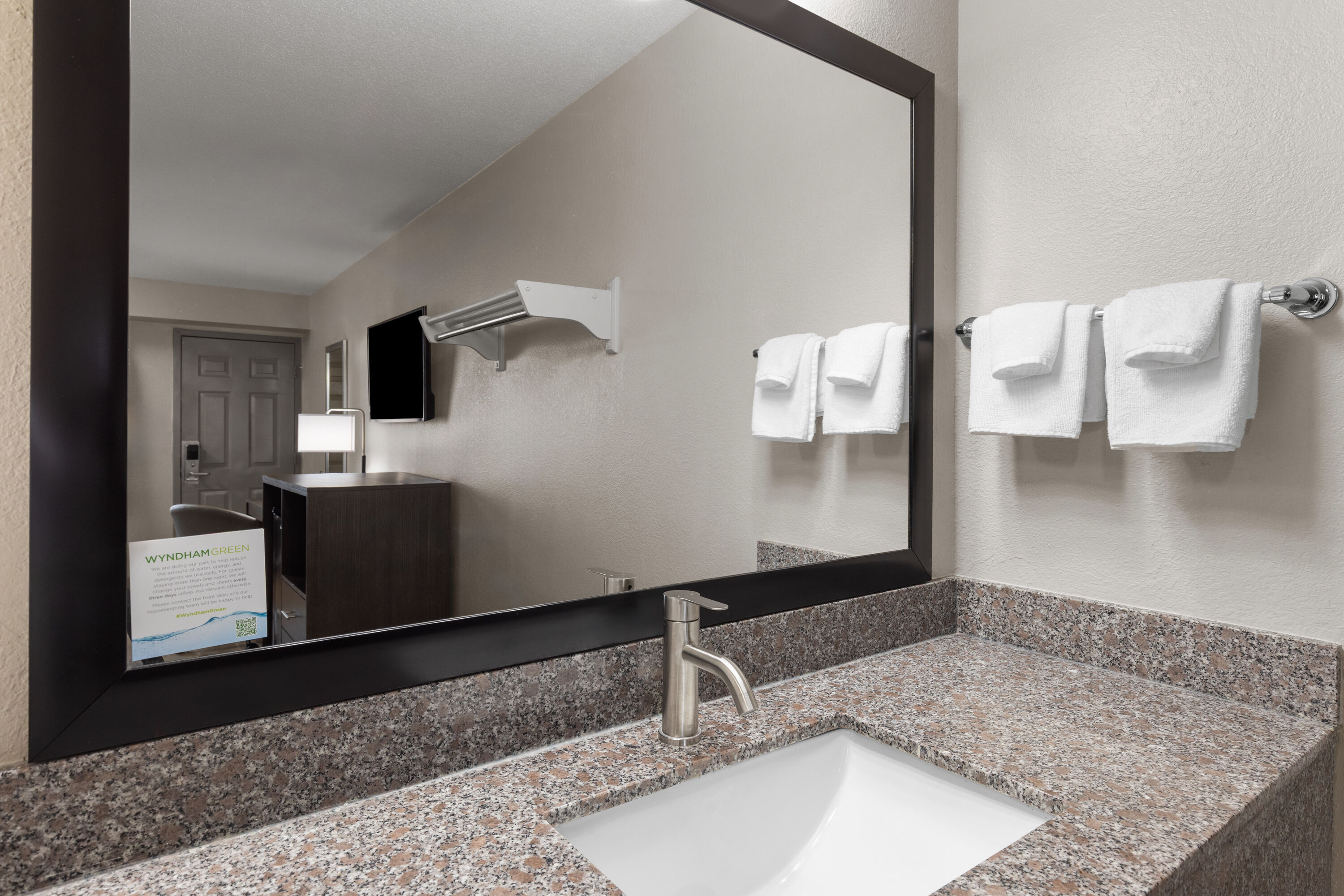 Guest room bath at the Super 8 by Wyndham Charleston WV in Charleston, West Virginia