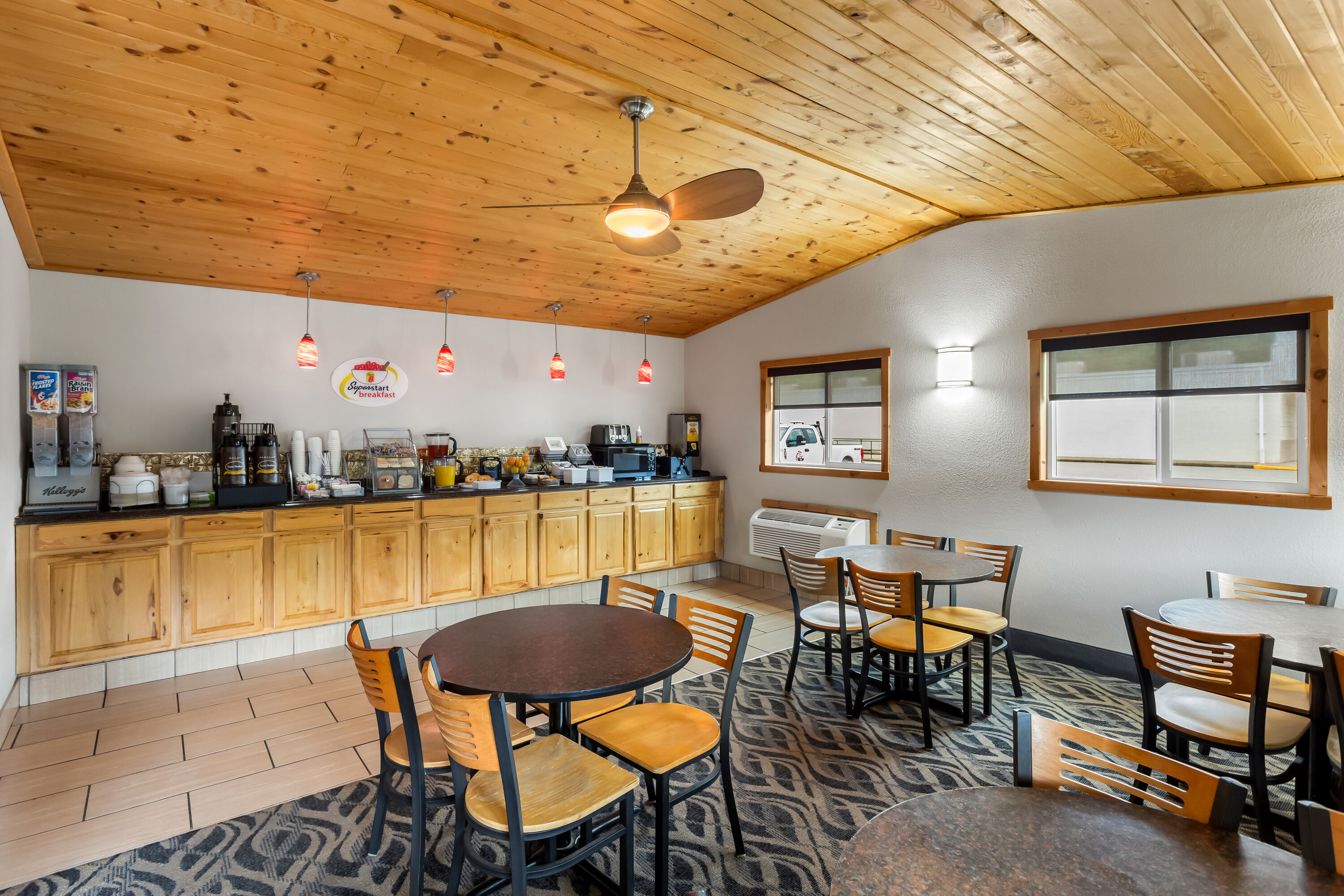 Super 8 by Wyndham Elkins restaurant breakfast area with seating in Elkins, West Virginia