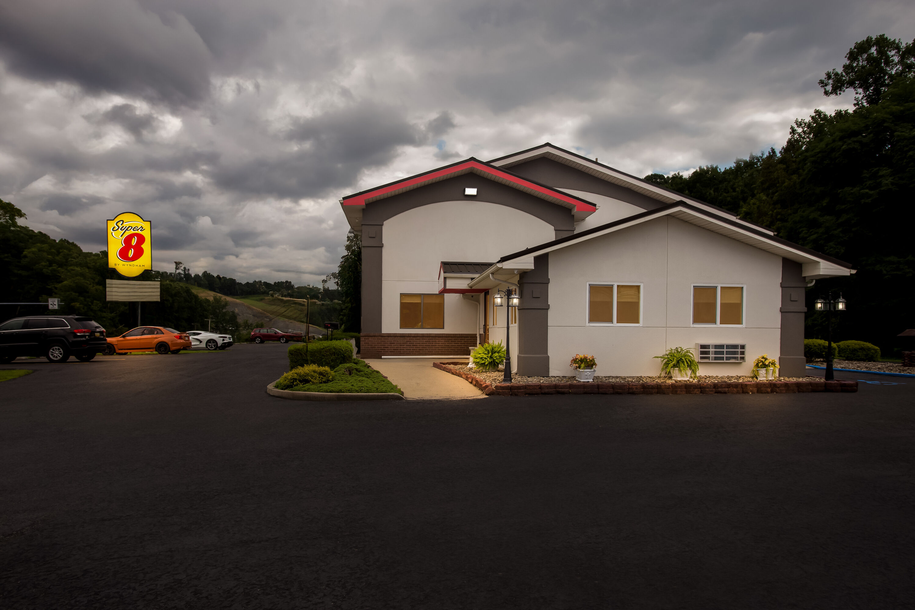 Exterior Night Image of Super 8 by Wyndham Elkins hotel in Elkins, West Virginia