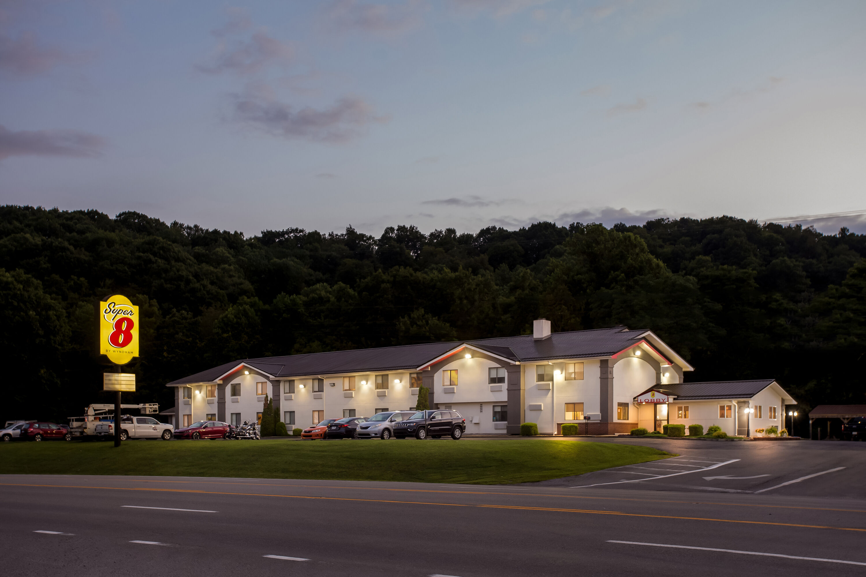 Exterior Night Image of Super 8 by Wyndham Elkins hotel in Elkins, West Virginia
