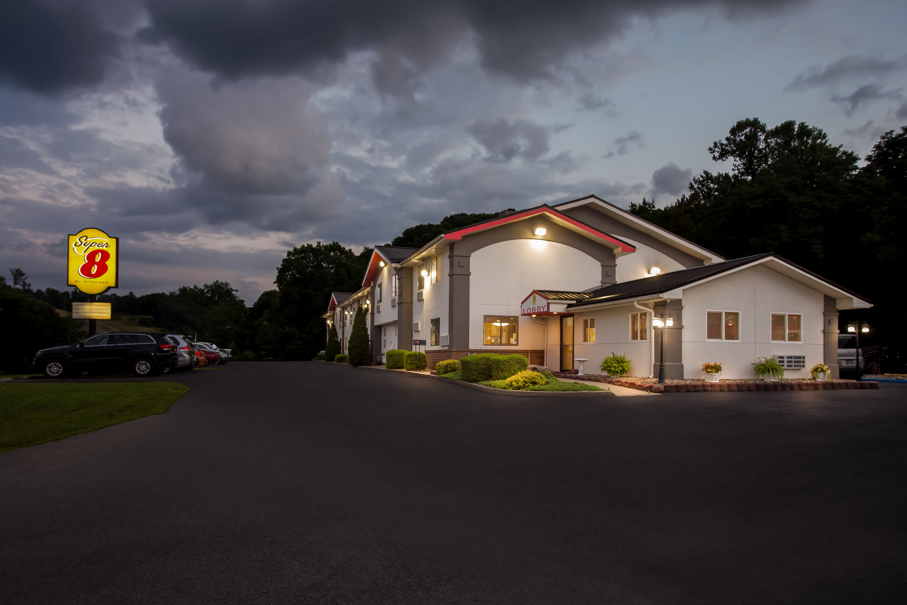 Exterior Night Image of Super 8 by Wyndham Elkins hotel in Elkins, West Virginia