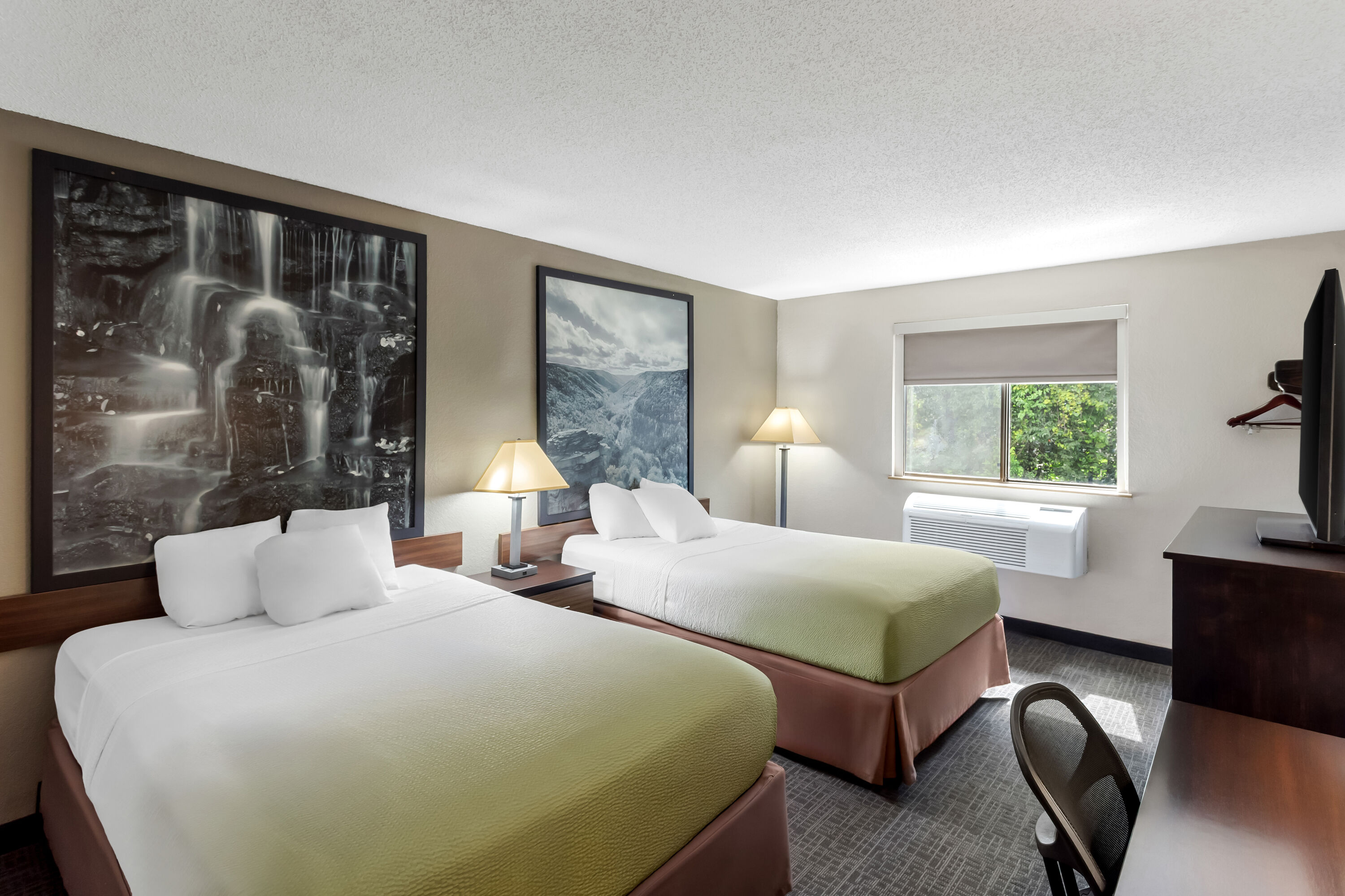 Double bed guest room at the Super 8 by Wyndham Elkins in Elkins, West Virginia