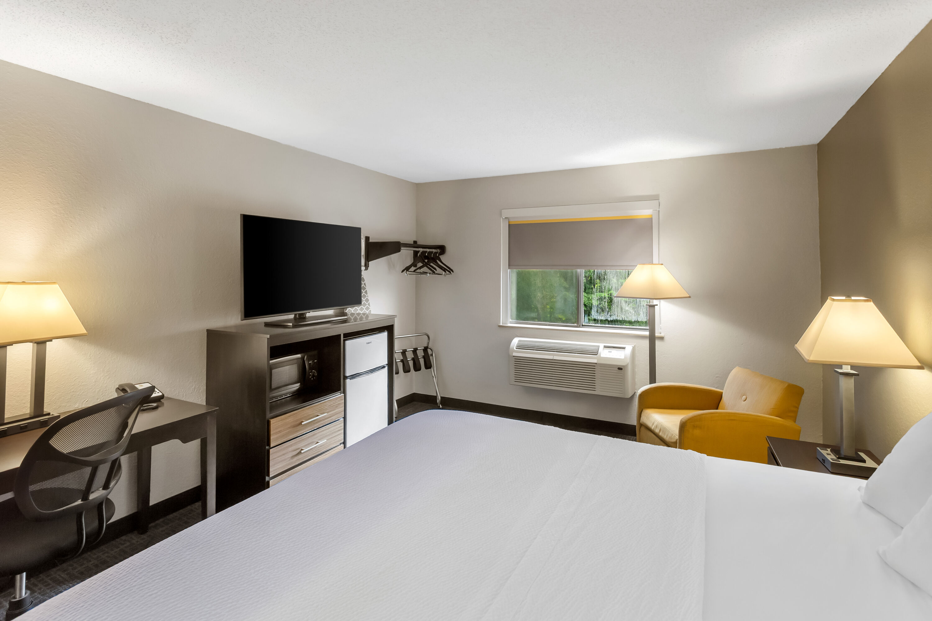 King bed guest room at the Super 8 by Wyndham Elkins in Elkins, West Virginia