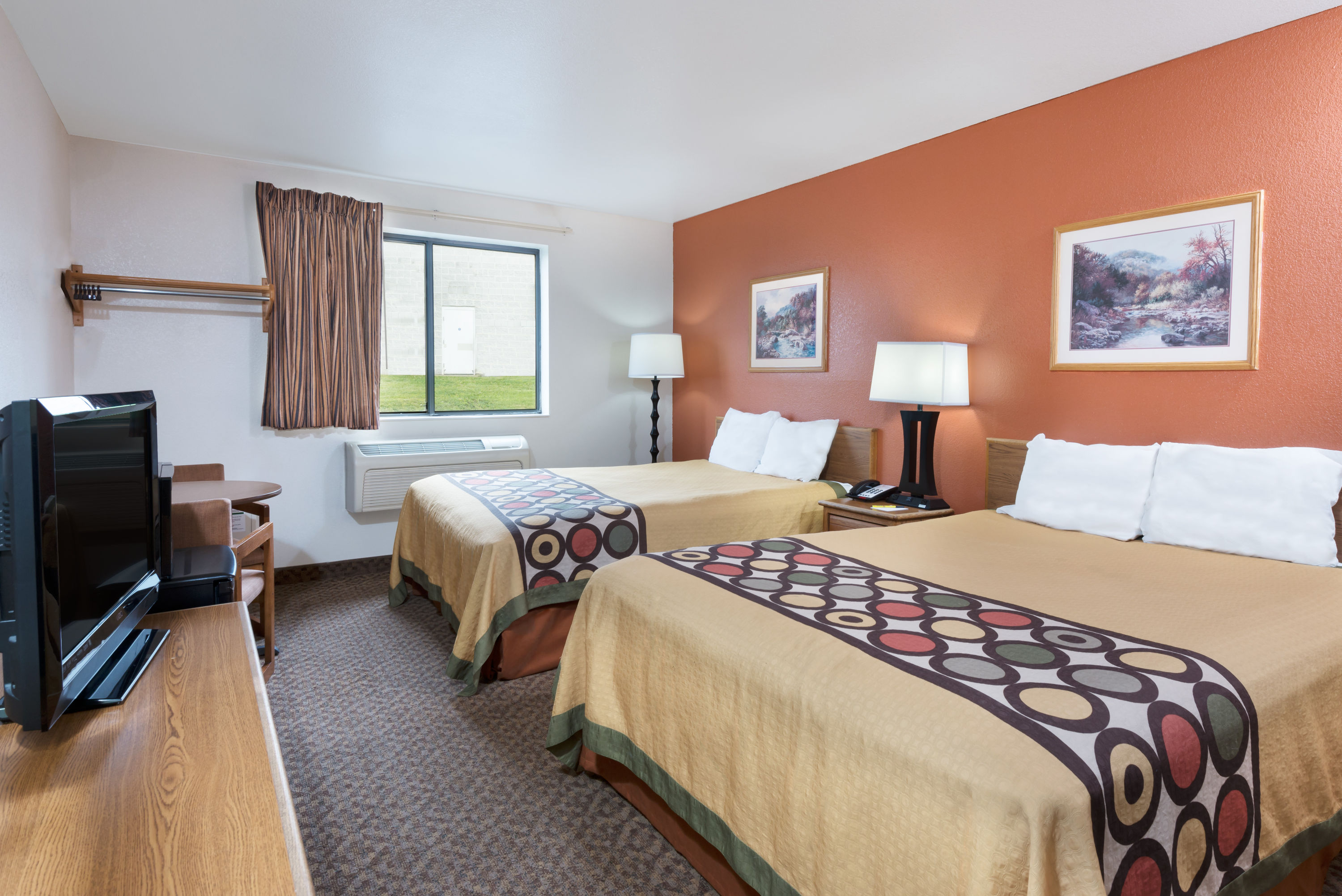 Guest room at the Super 8 by Wyndham Morgantown in Morgantown, West Virginia