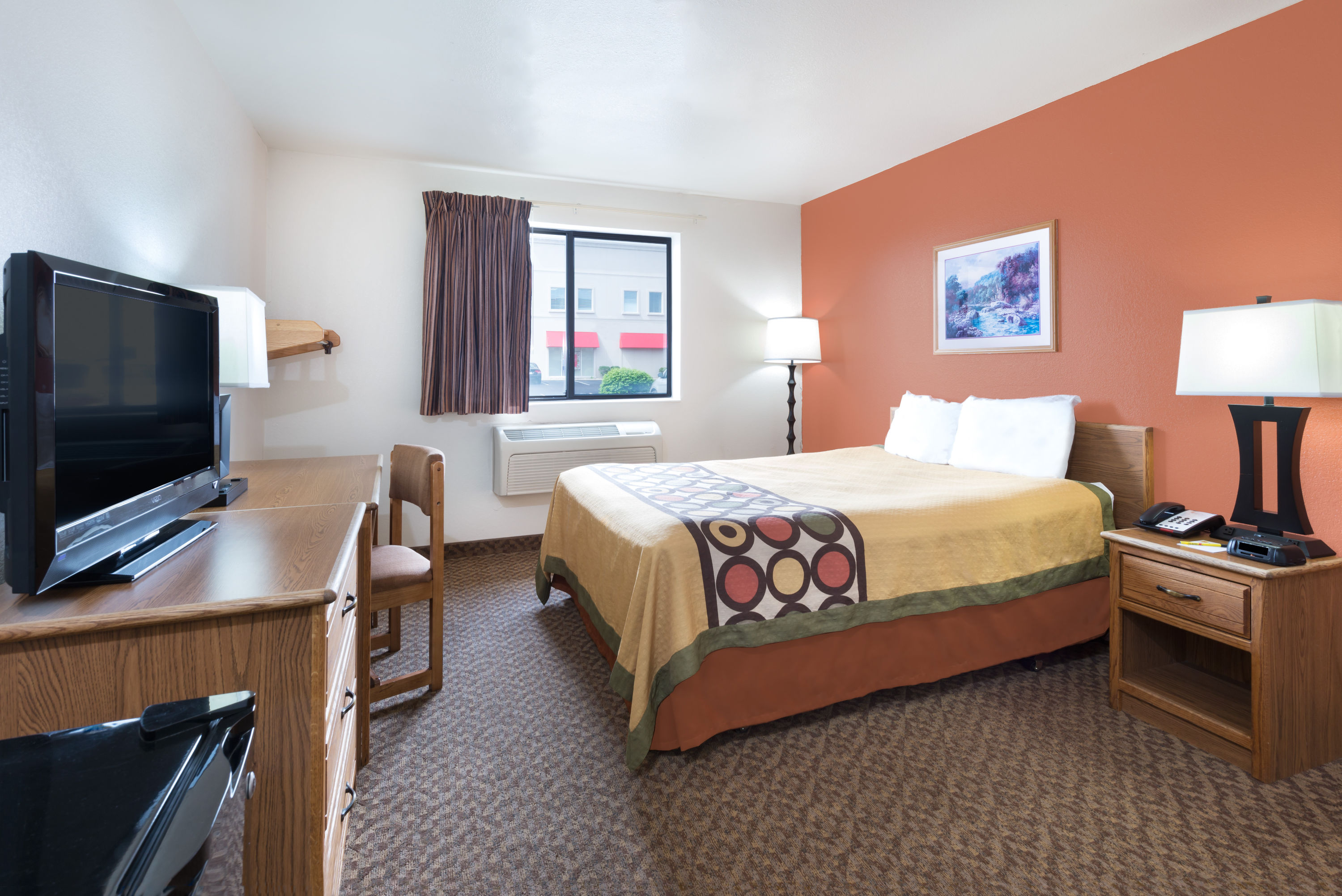 Guest room at the Super 8 by Wyndham Morgantown in Morgantown, West Virginia