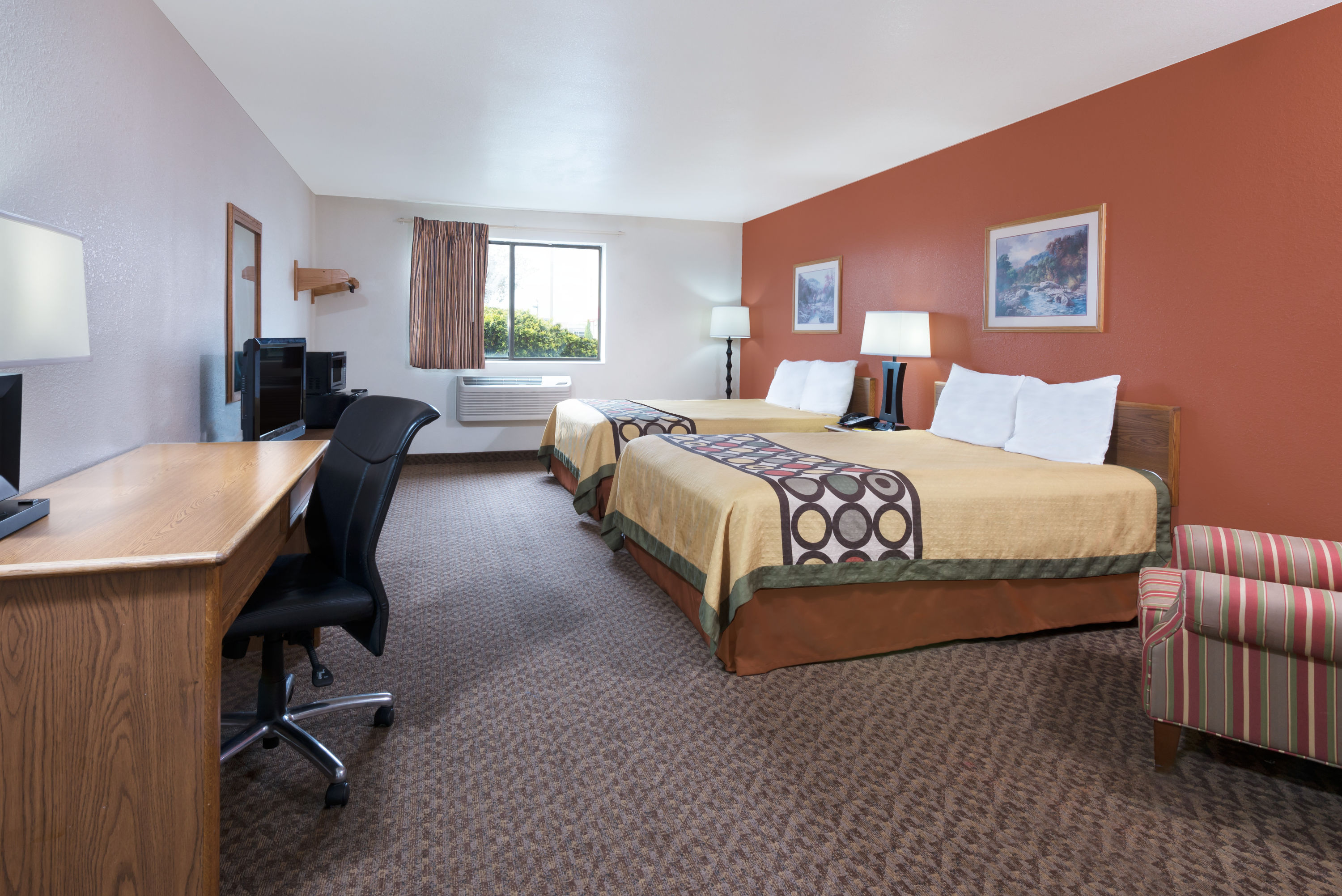 Guest room at the Super 8 by Wyndham Morgantown in Morgantown, West Virginia
