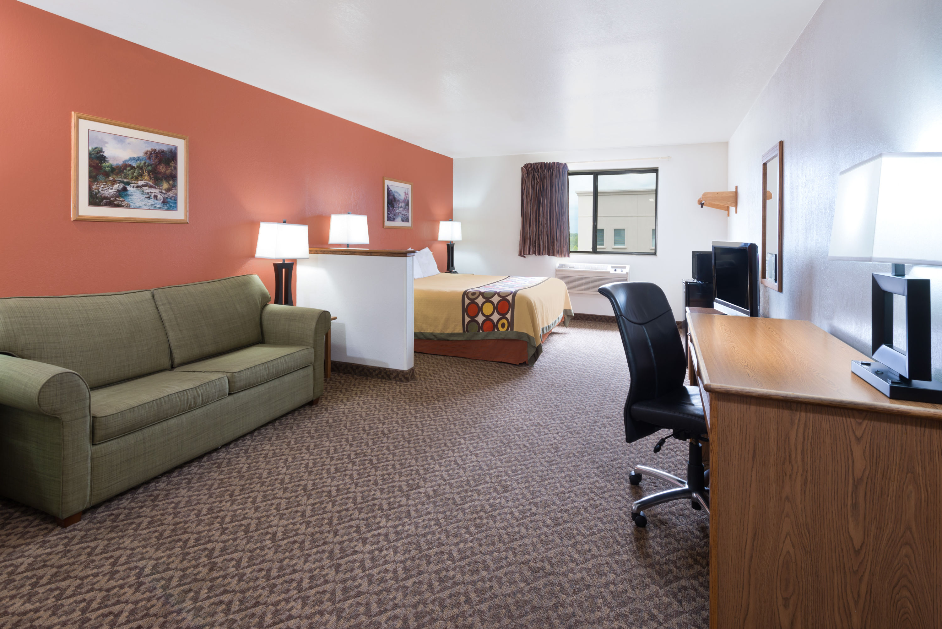 Guest room at the Super 8 by Wyndham Morgantown in Morgantown, West Virginia