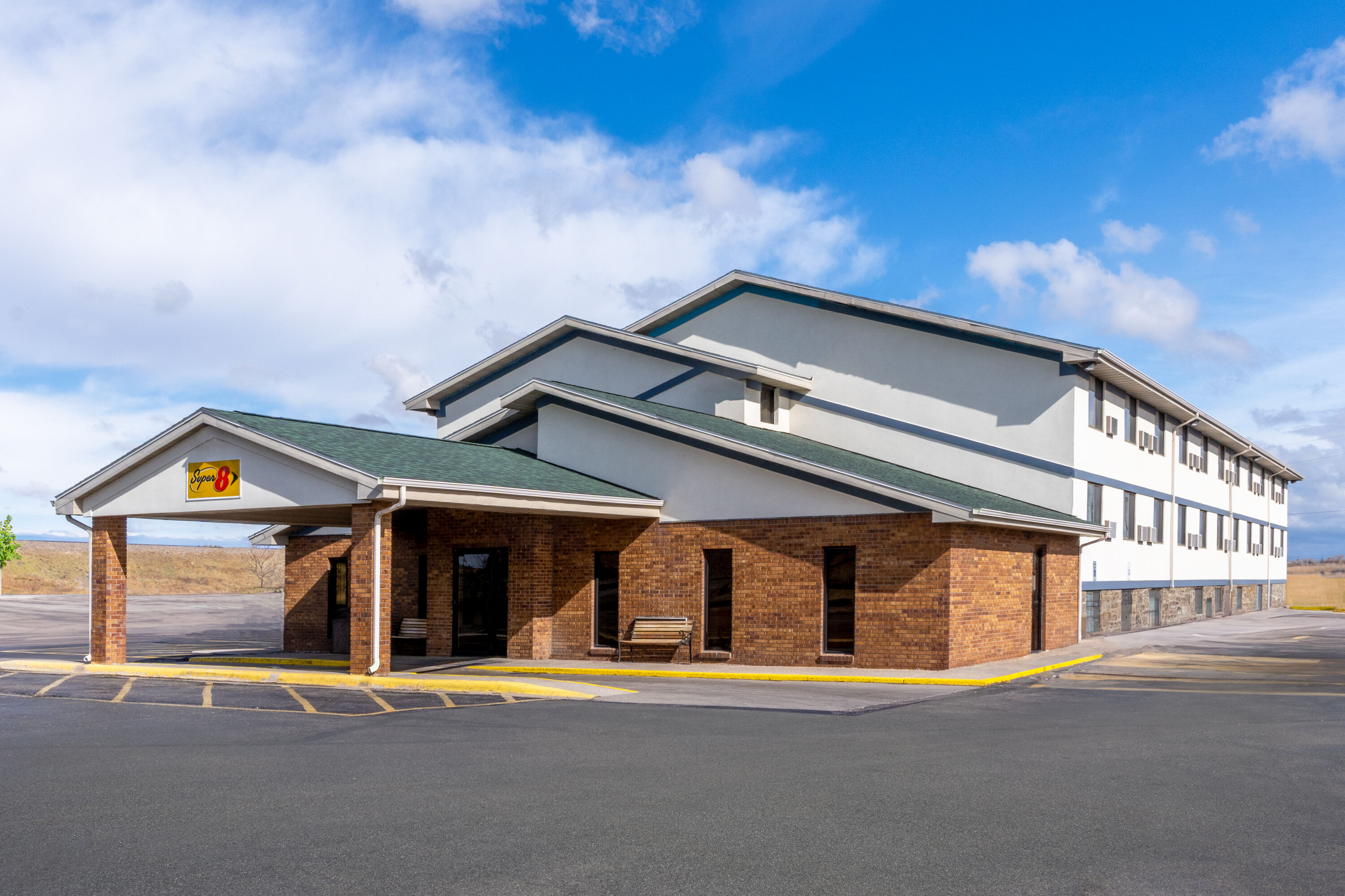 Exterior Day Image of Super 8 by Wyndham Cheyenne WY hotel in Cheyenne, Wyoming