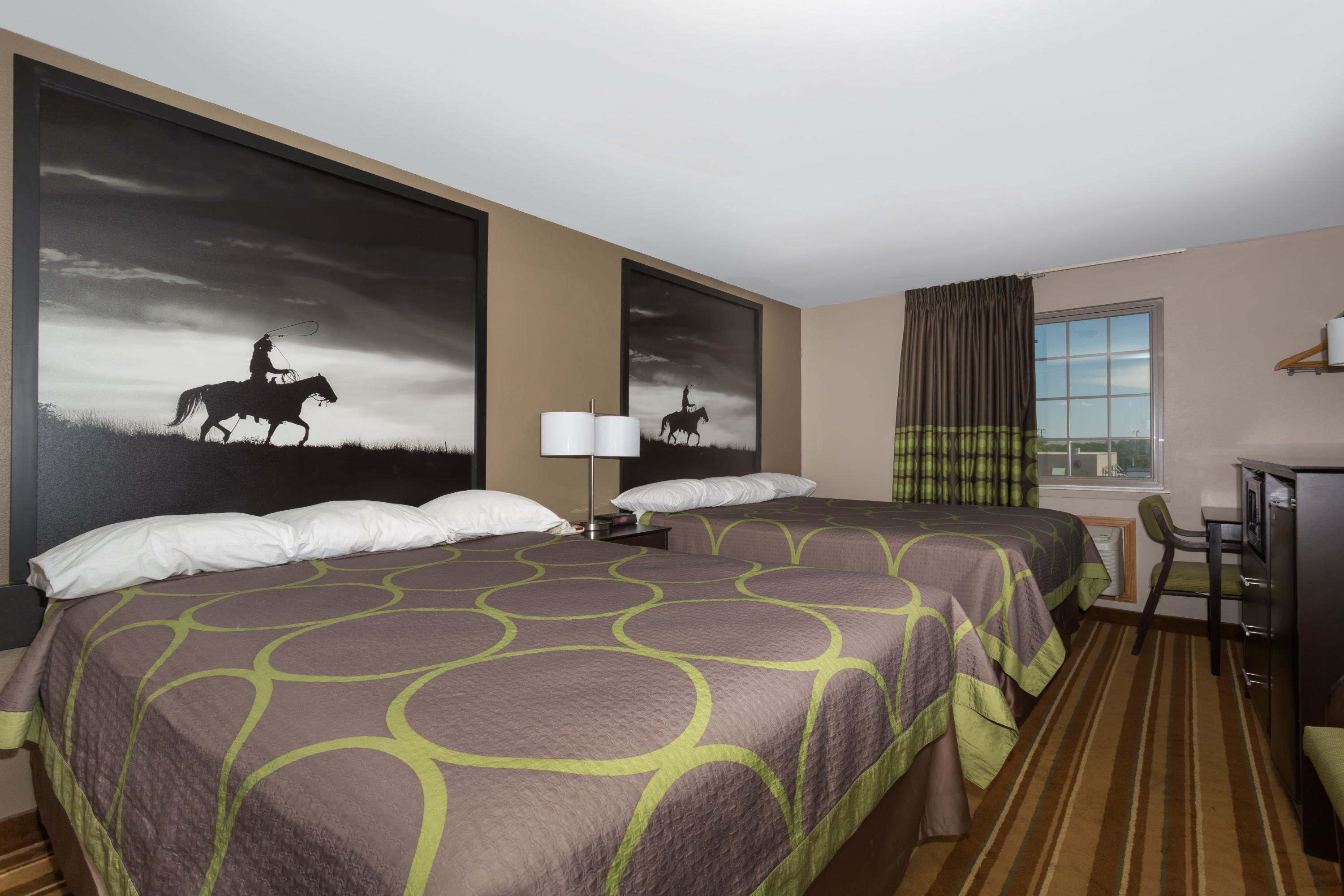 Guest room at the Super 8 by Wyndham Douglas in Douglas, Wyoming