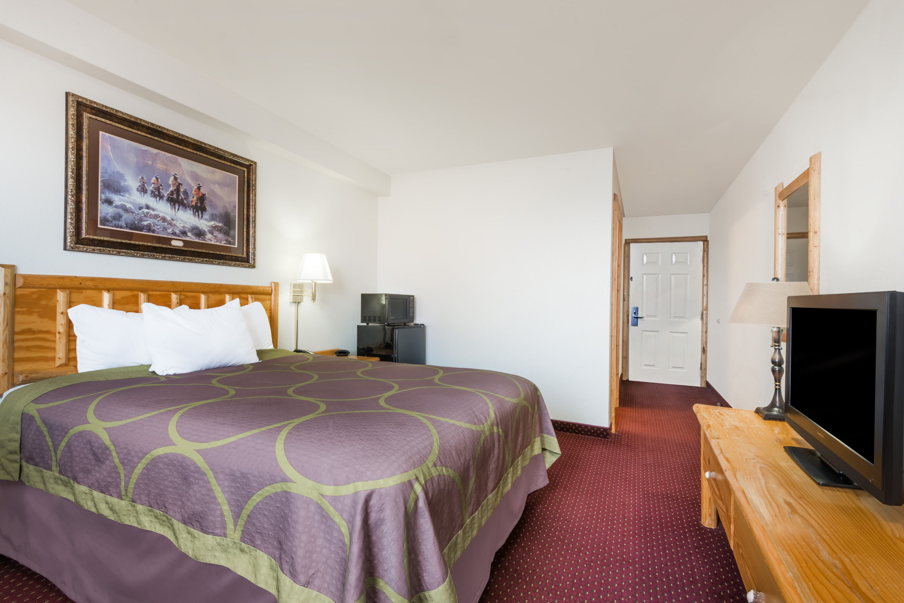 Guest room at the Super 8 by Wyndham Powell in Powell, Wyoming