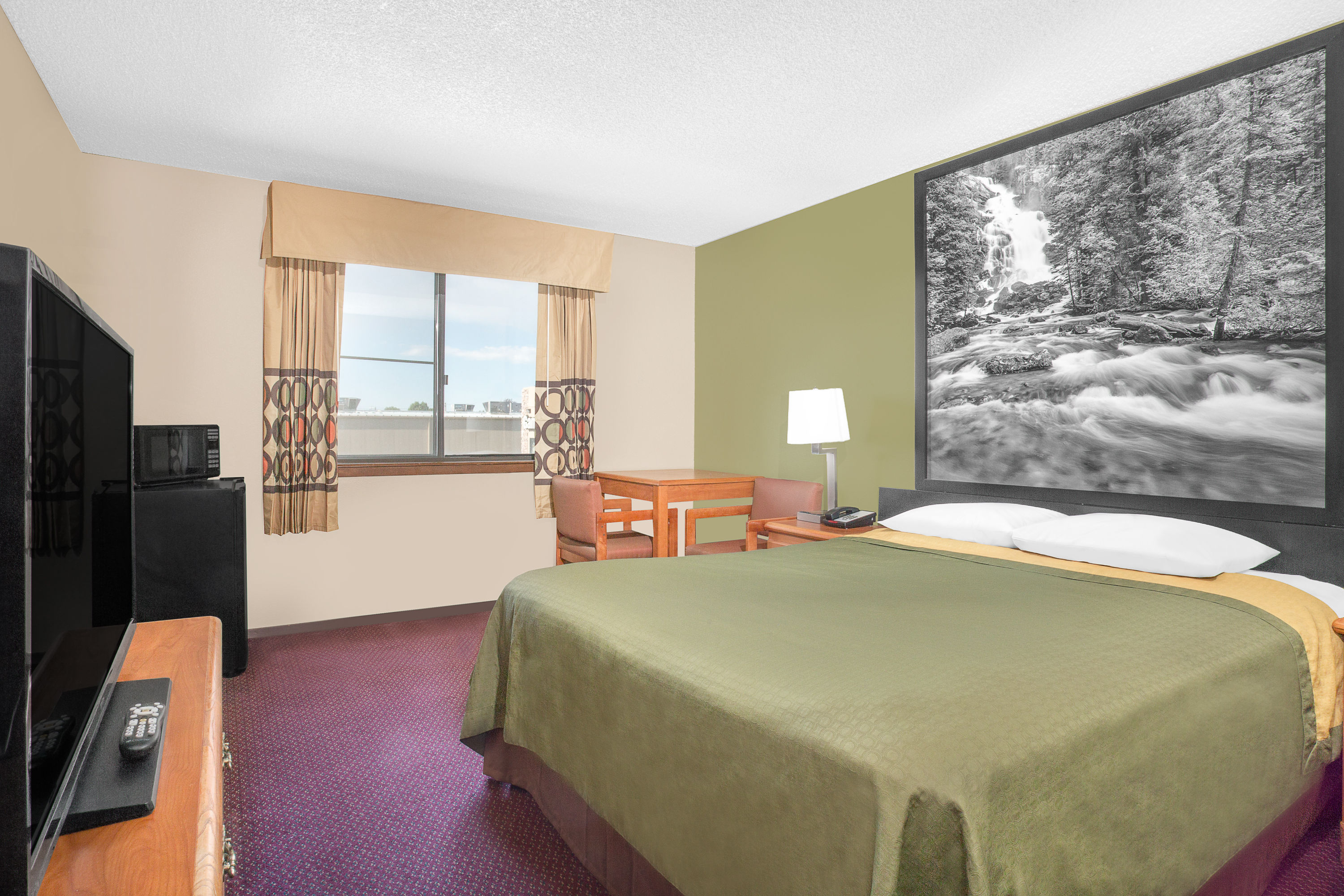 Guest room at the Super 8 by Wyndham Riverton in Riverton, Wyoming