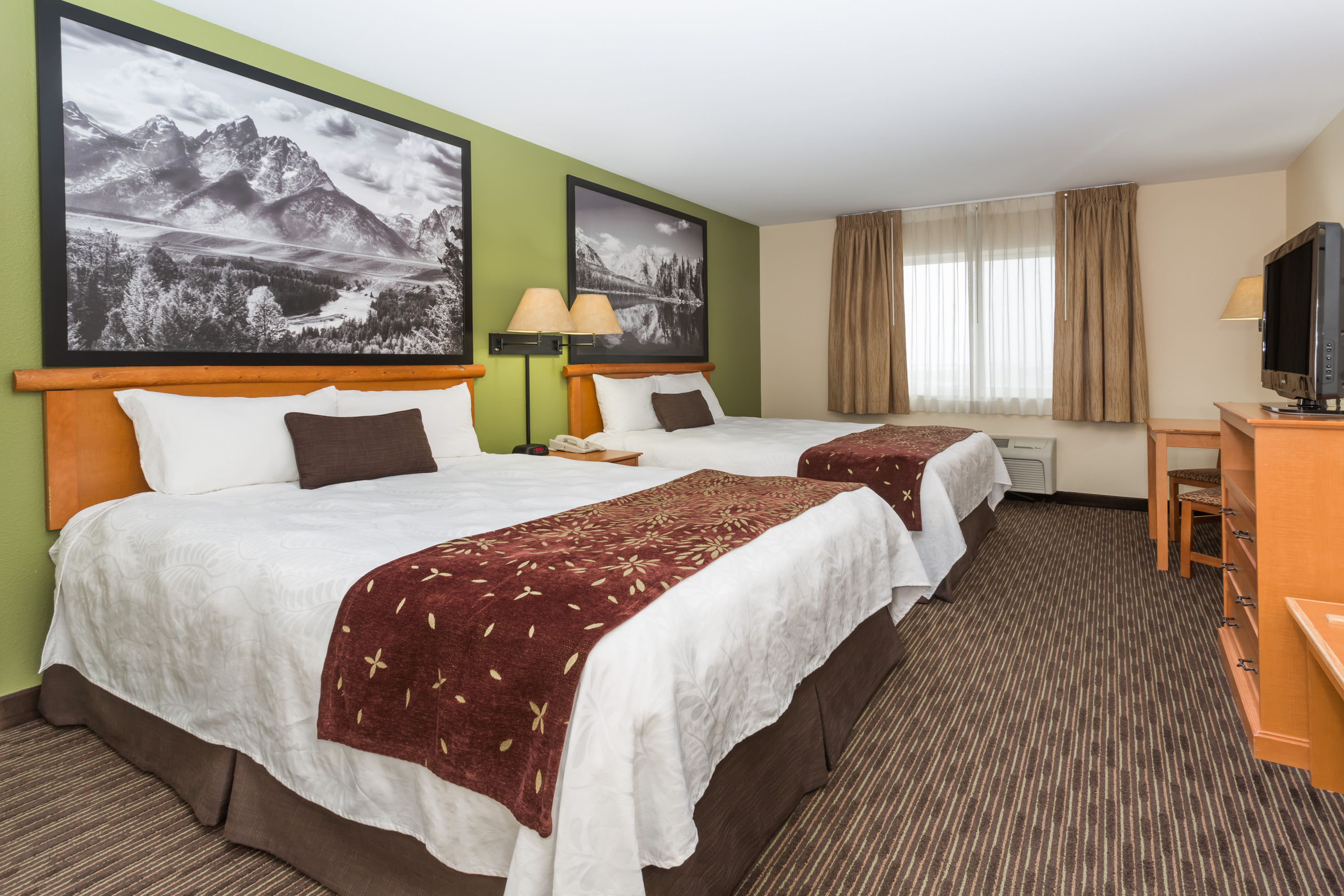 Double bed guest room at the Super 8 by Wyndham Wheatland Wyoming in Wheatland, Wyoming