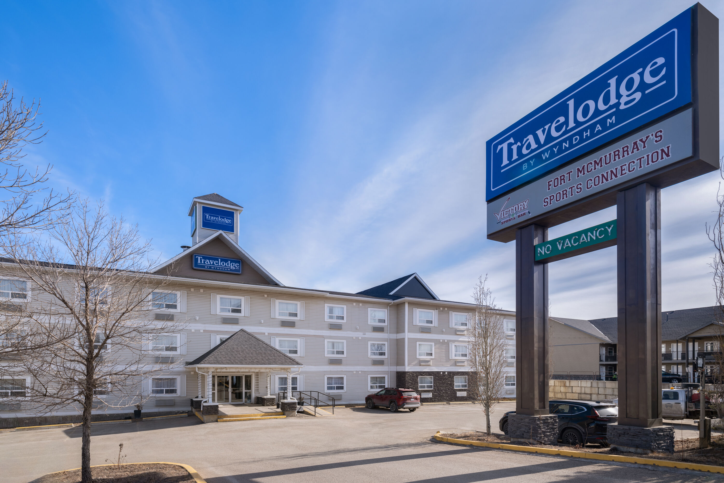 Exterior Day Image of Travelodge by Wyndham Fort McMurray hotel in Fort McMurray, Alberta