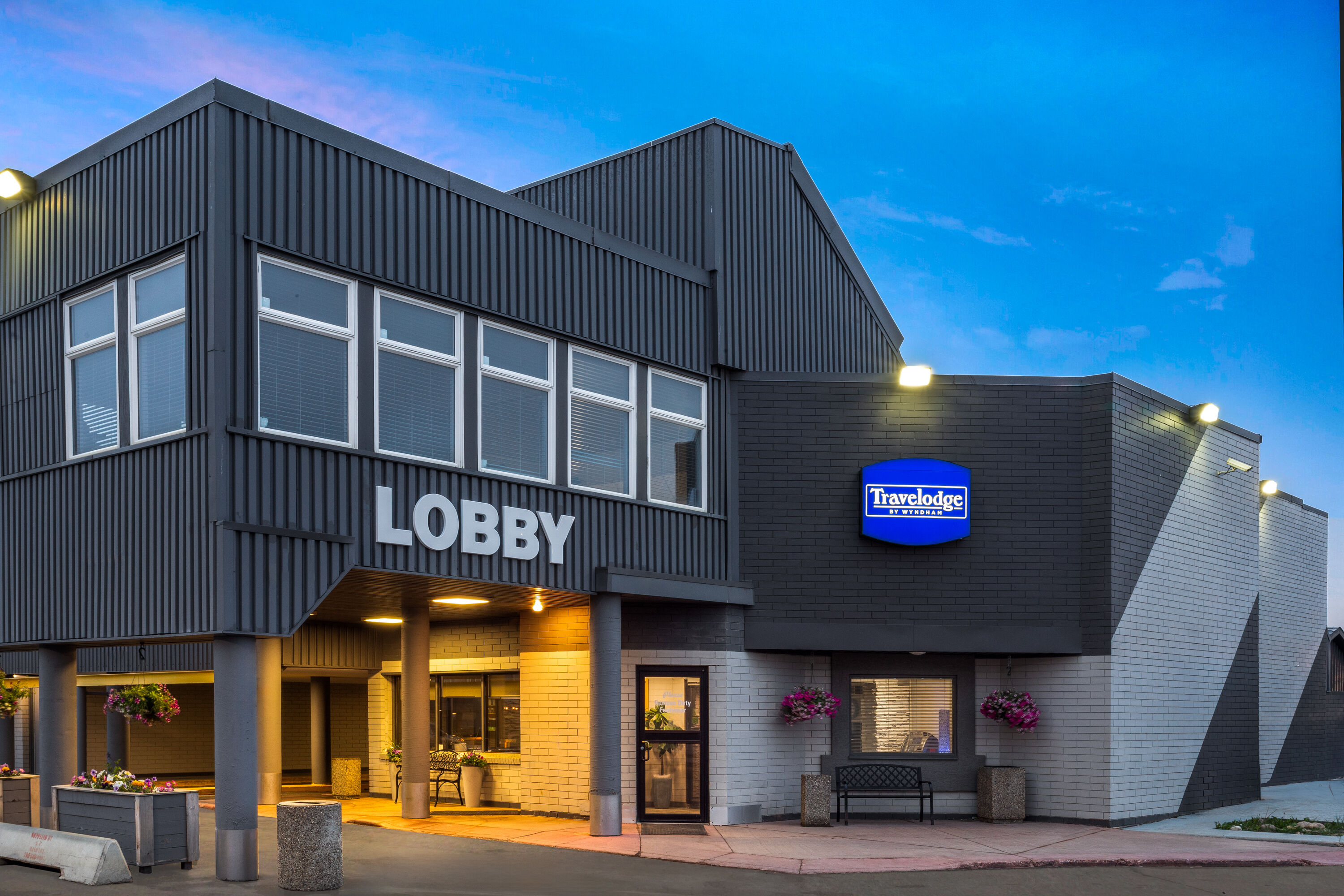 Exterior Dusk Image of Travelodge by Wyndham Grande Prairie hotel in Grande Prairie, Alberta