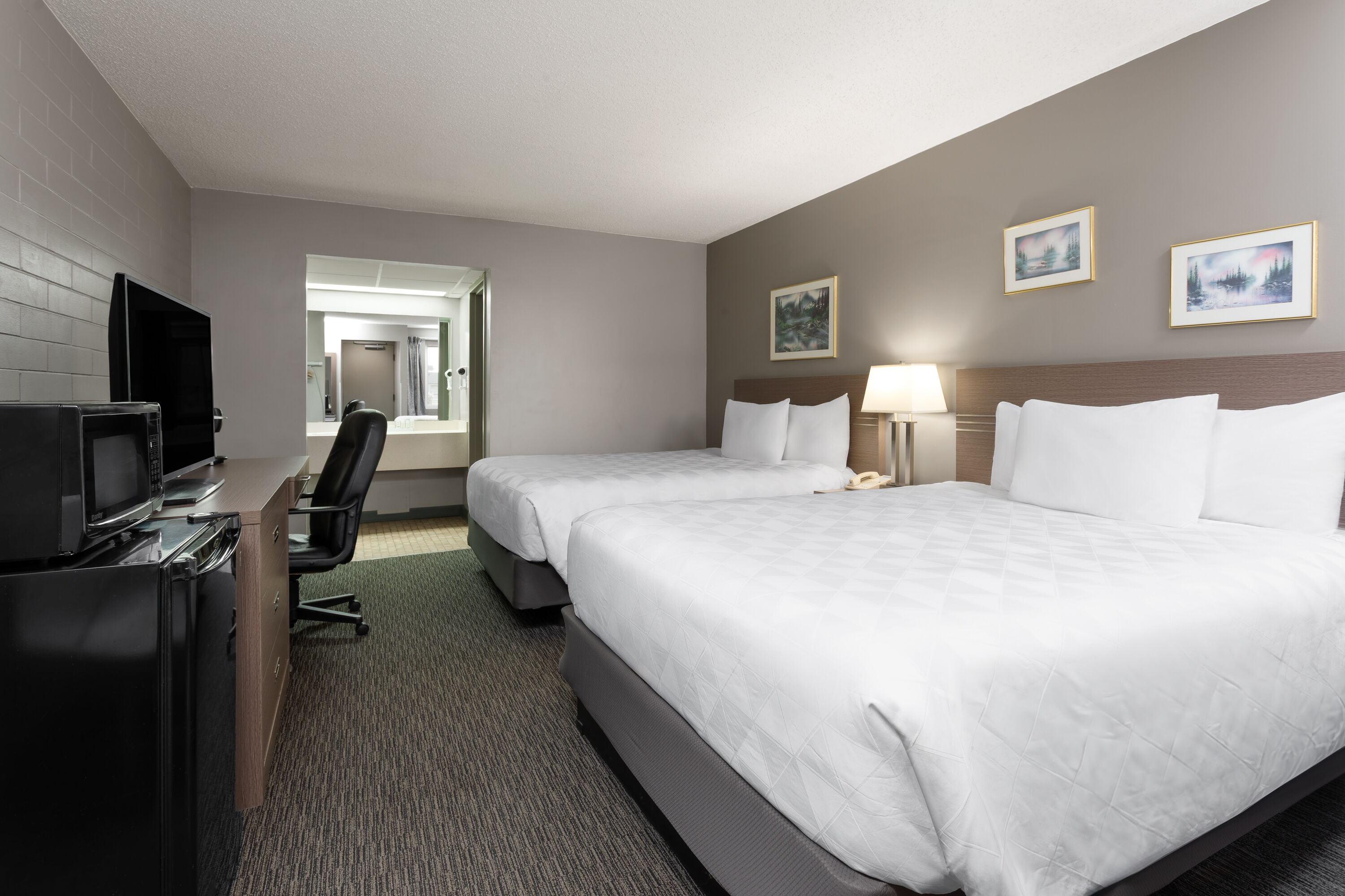 Guest room at the Travelodge by Wyndham Grande Prairie in Grande Prairie, Alberta