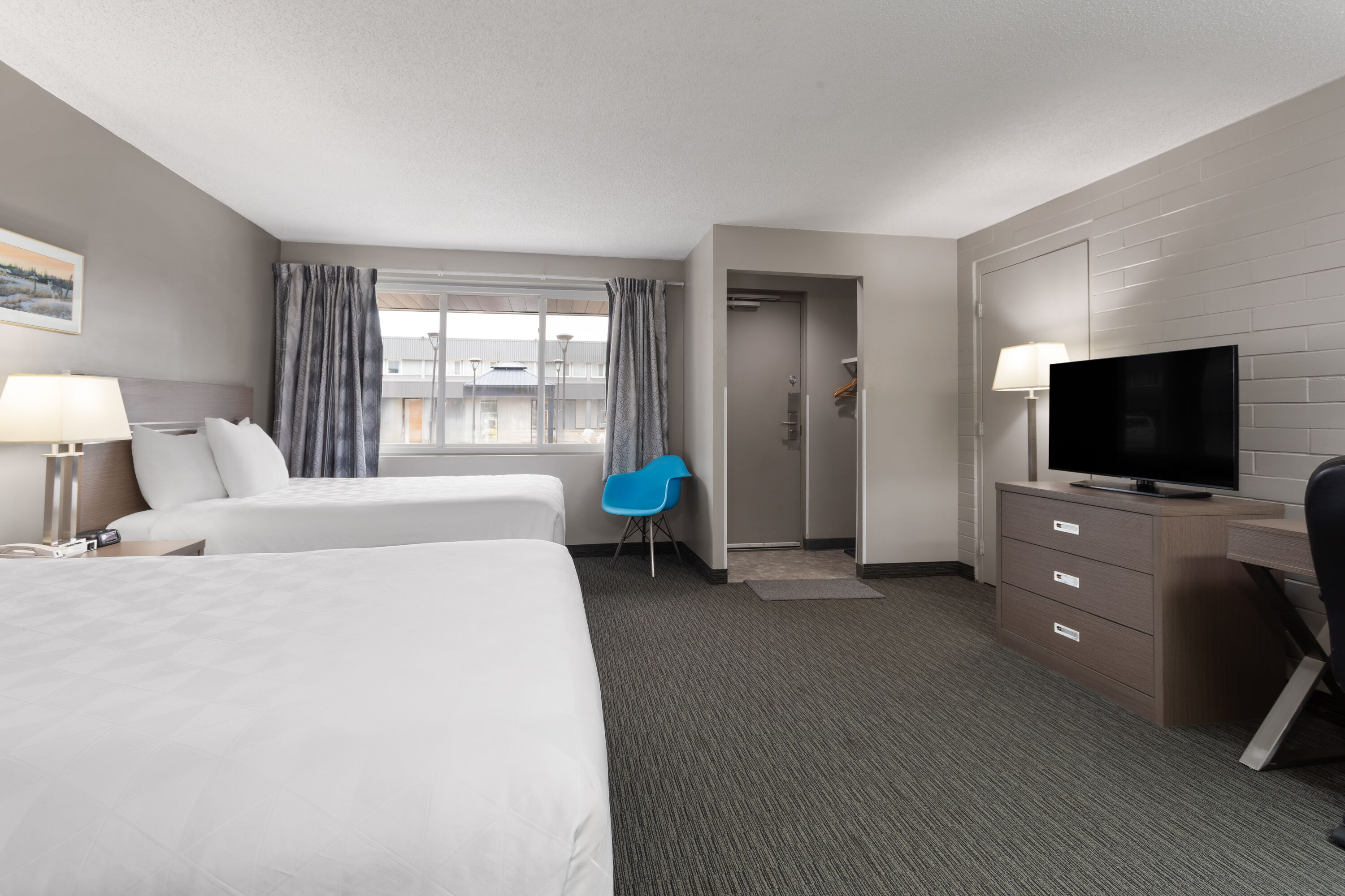 Guest room at the Travelodge by Wyndham Grande Prairie in Grande Prairie, Alberta