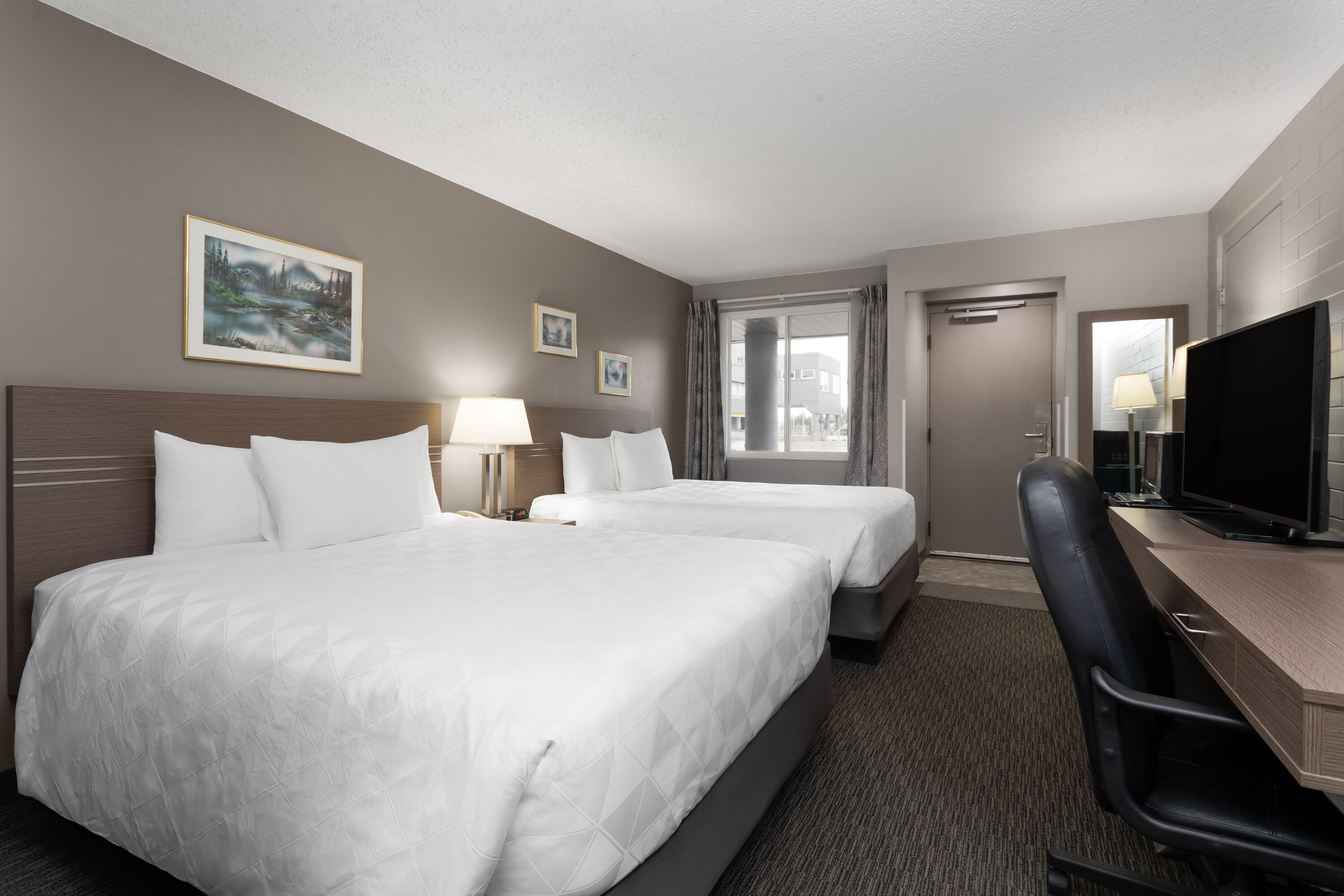 Guest room at the Travelodge by Wyndham Grande Prairie in Grande Prairie, Alberta