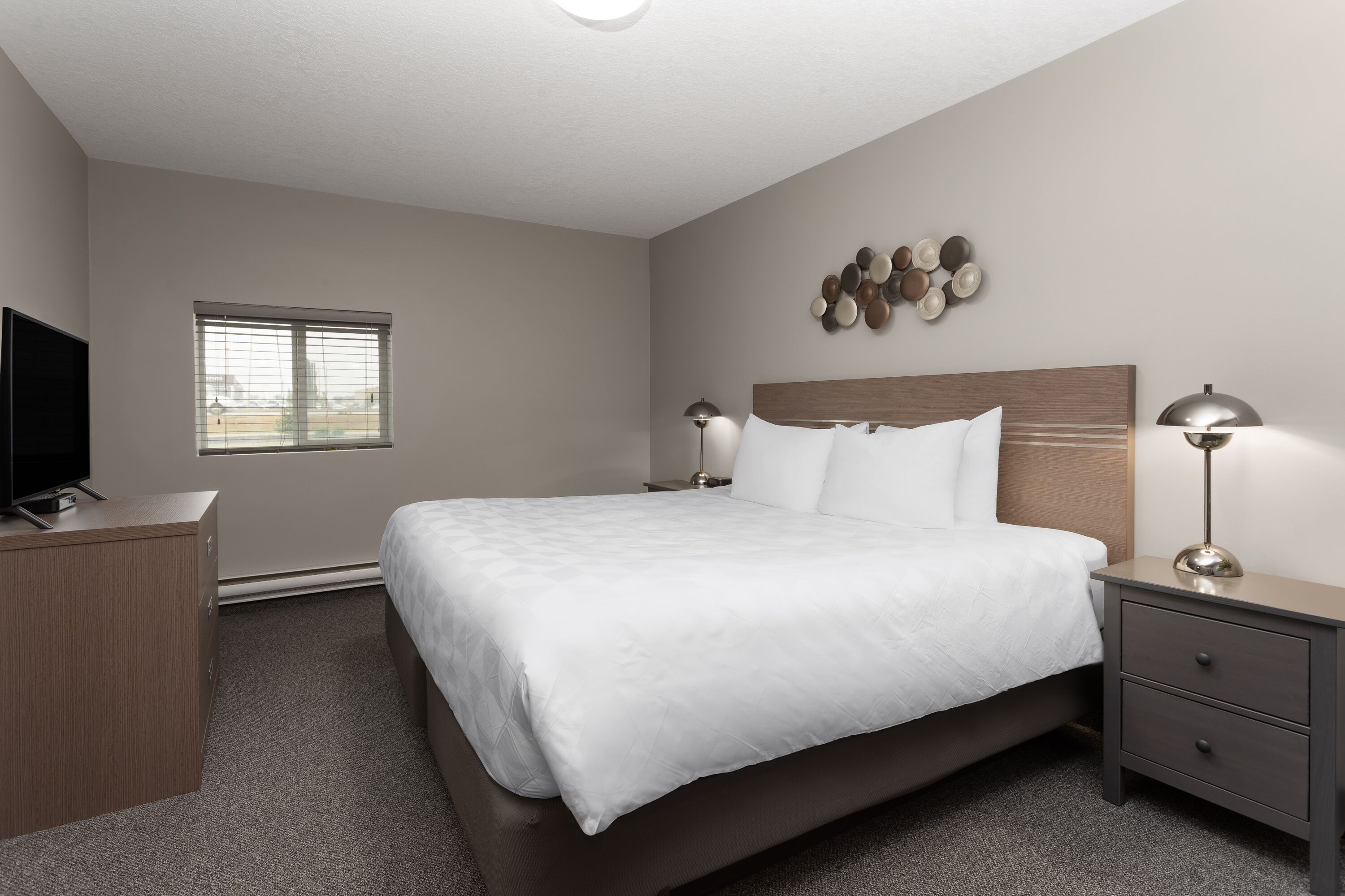 Guest room at the Travelodge by Wyndham Grande Prairie in Grande Prairie, Alberta