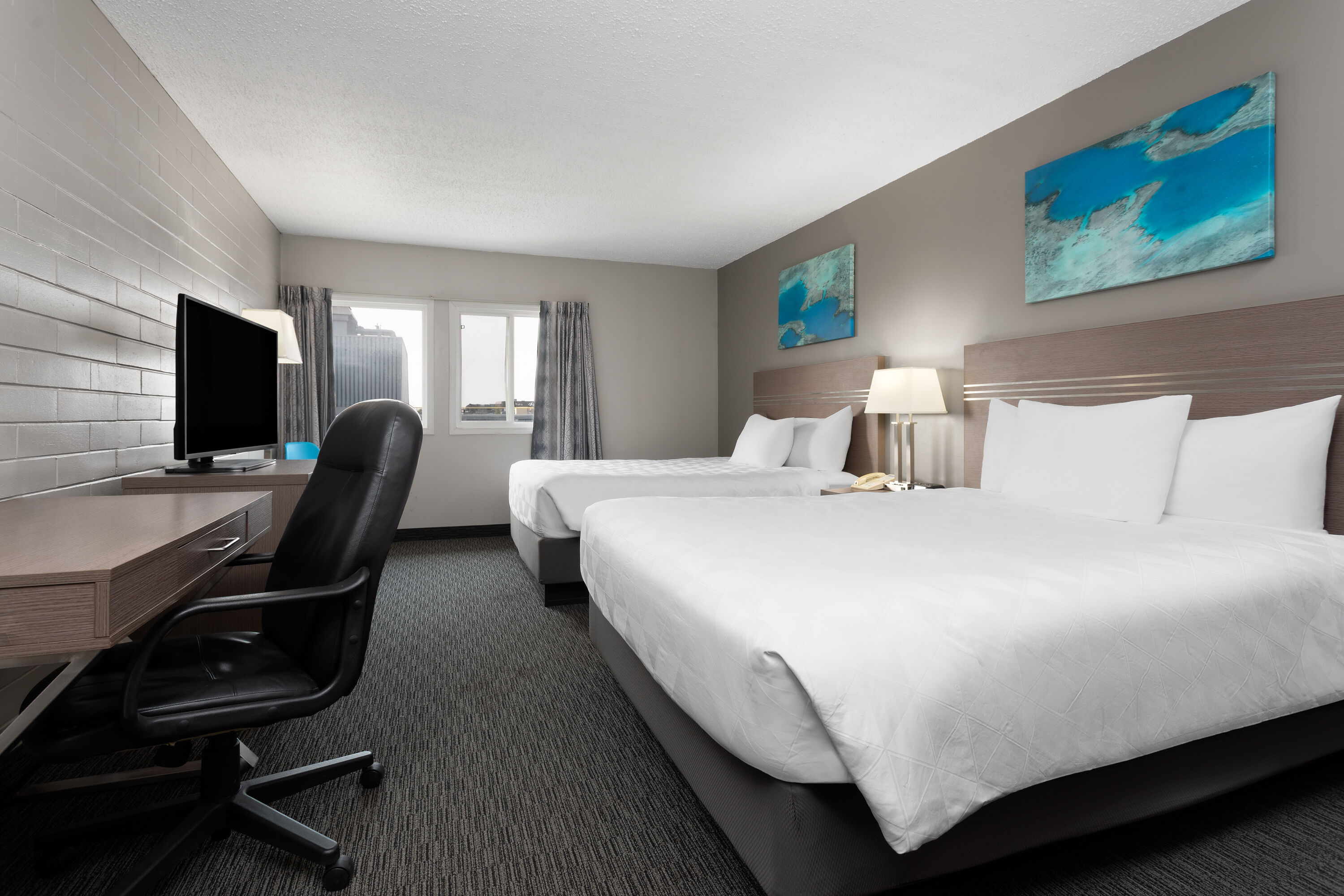 Guest room at the Travelodge by Wyndham Grande Prairie in Grande Prairie, Alberta