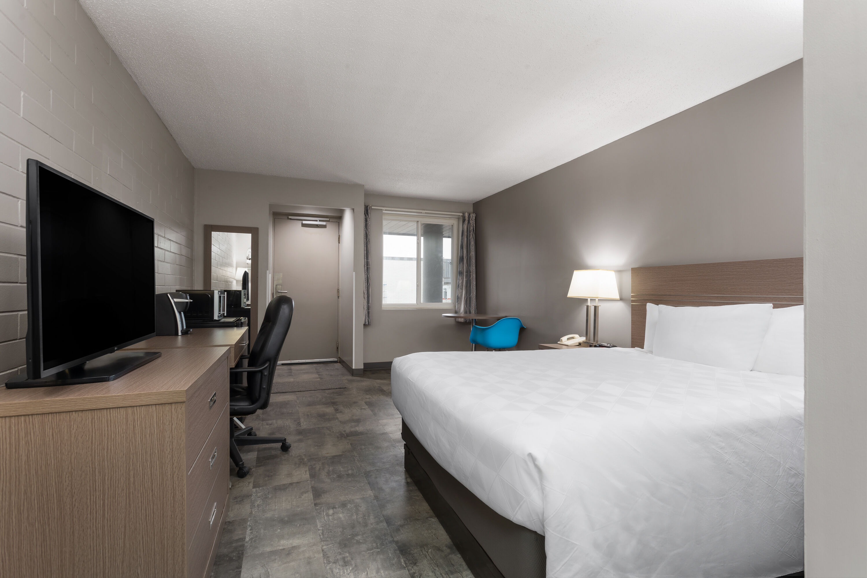 Guest room at the Travelodge by Wyndham Grande Prairie in Grande Prairie, Alberta