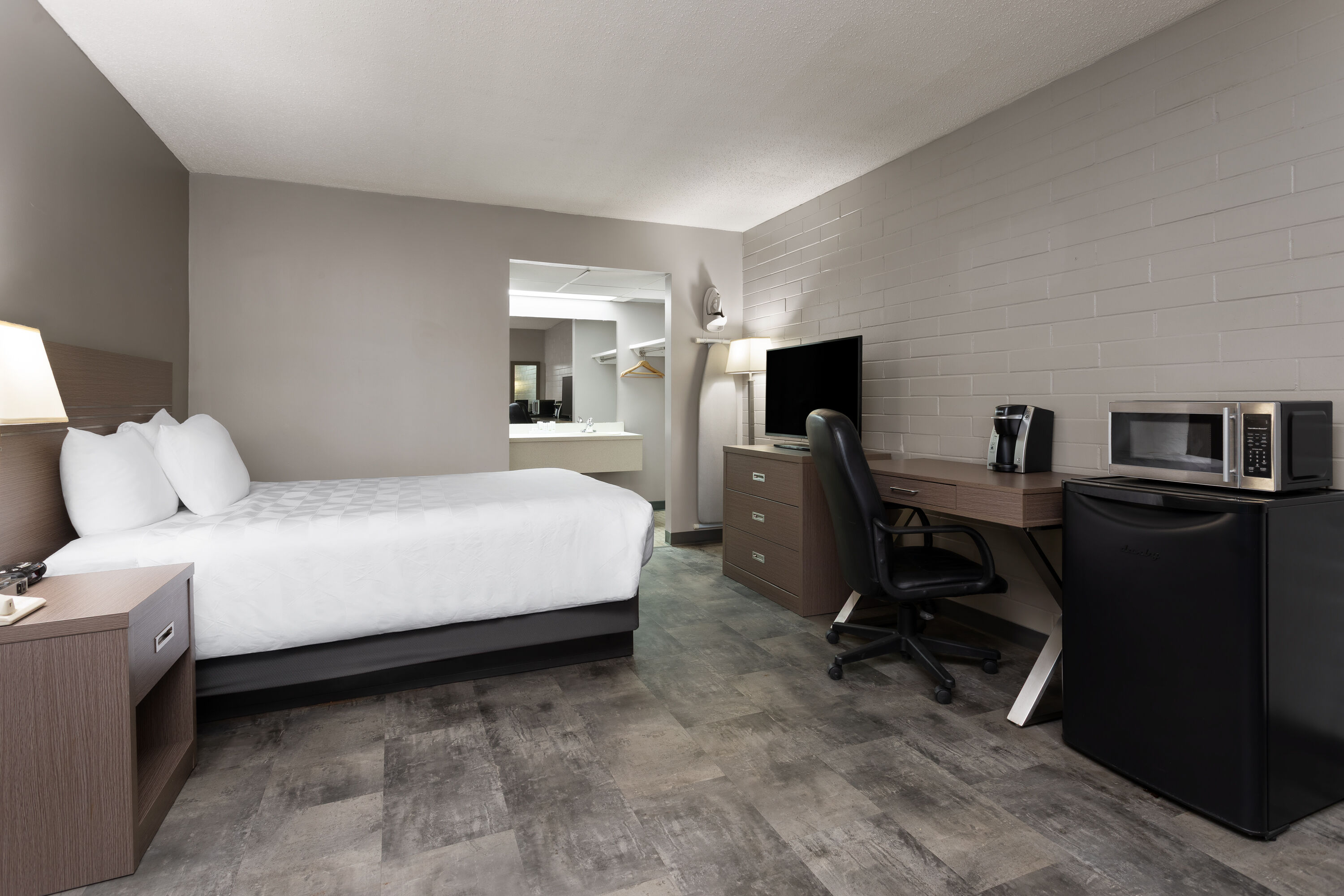 Guest room at the Travelodge by Wyndham Grande Prairie in Grande Prairie, Alberta