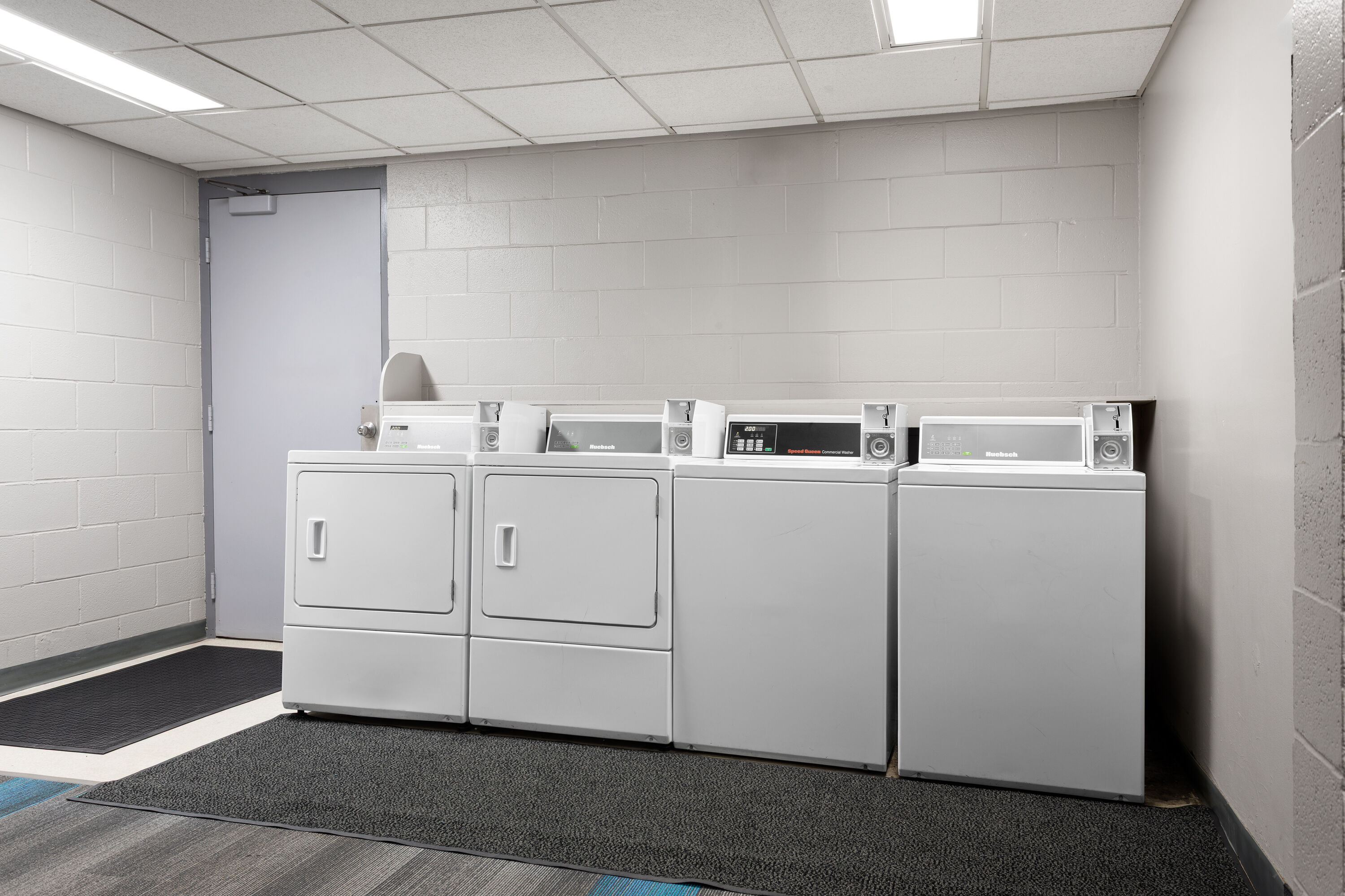 Laundry facilities at Travelodge by Wyndham Grande Prairie in Grande Prairie, Alberta