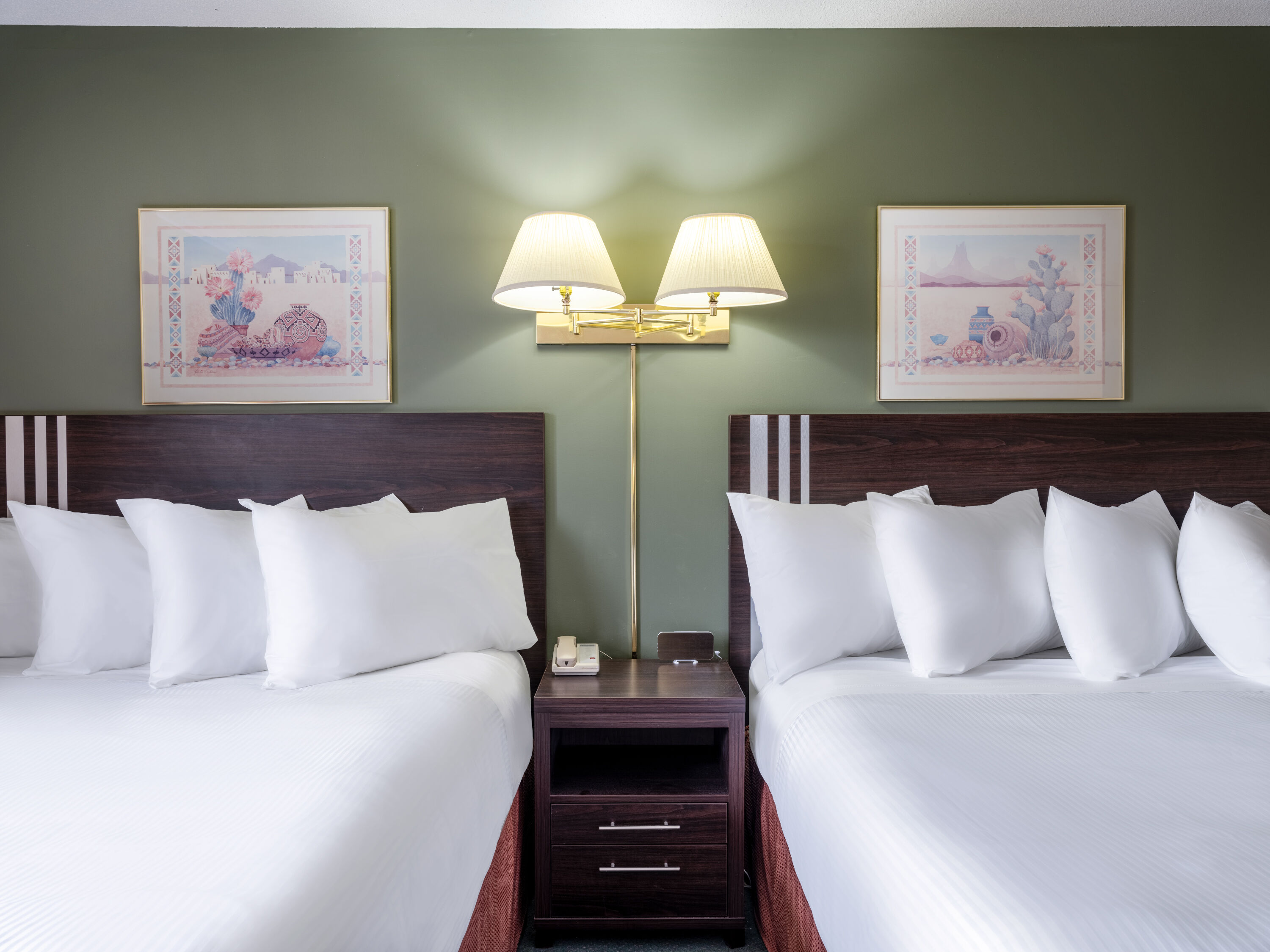 Guest room at the Travelodge by Wyndham Lacombe in Lacombe, Alberta