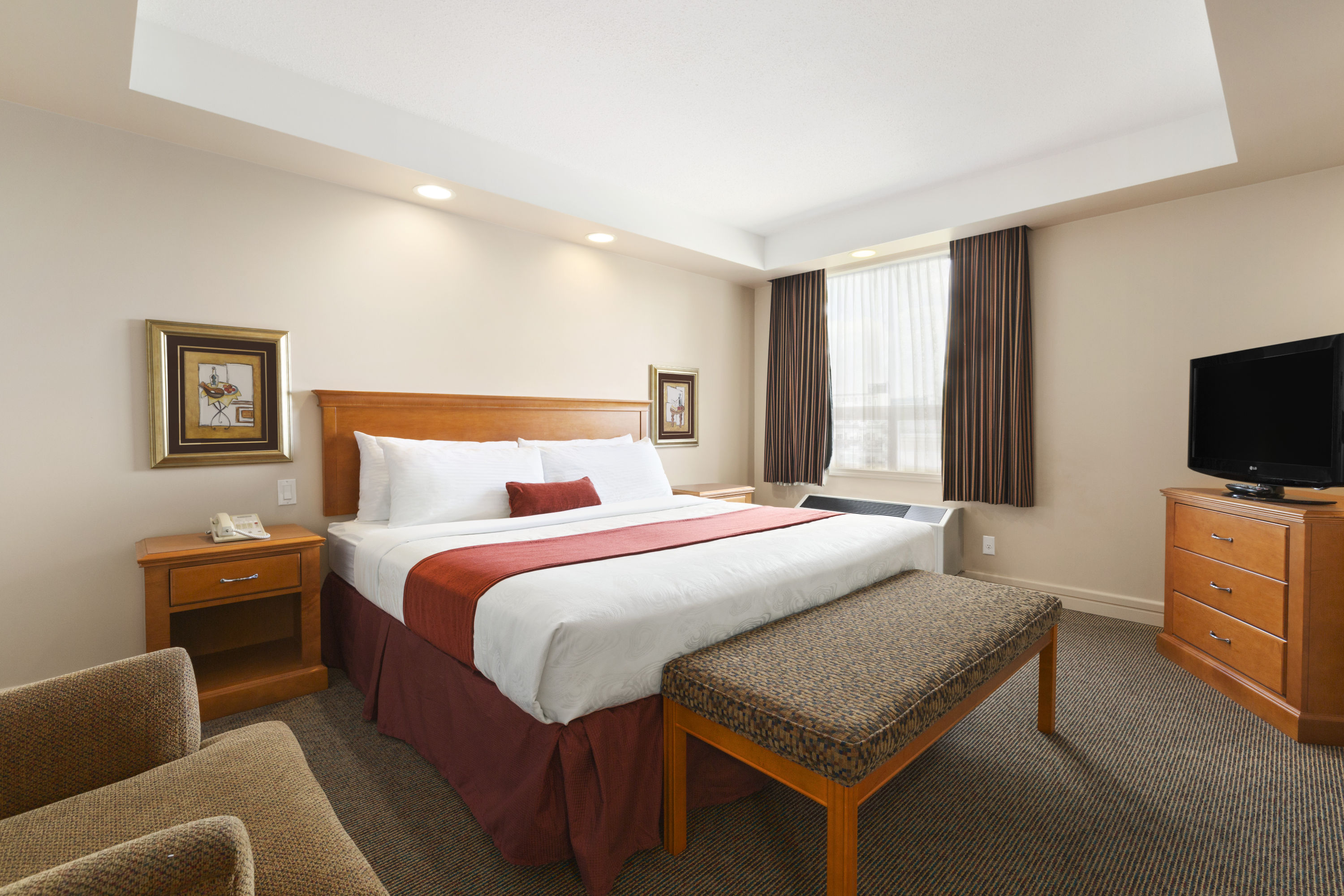 Guest room at the Travelodge by Wyndham Spruce Grove in Spruce Grove, Alberta