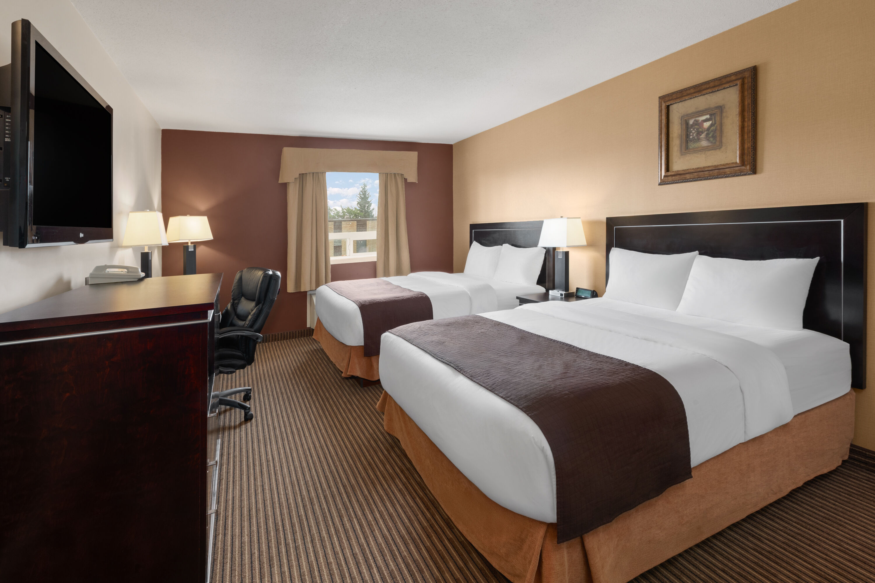Guest room at the Travelodge by Wyndham Valleyview AB in Valleyview, Alberta