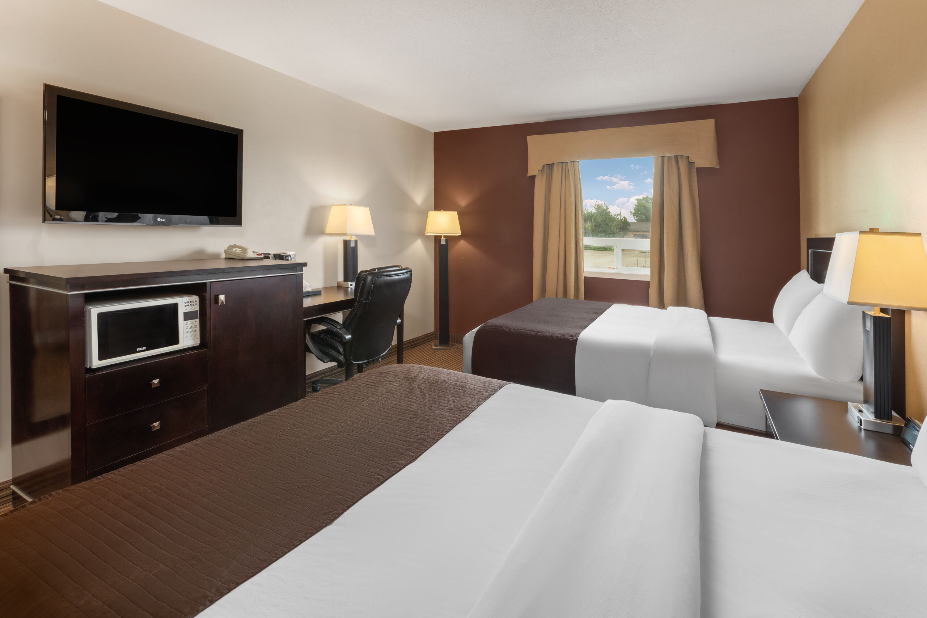 Guest room at the Travelodge by Wyndham Valleyview AB in Valleyview, Alberta