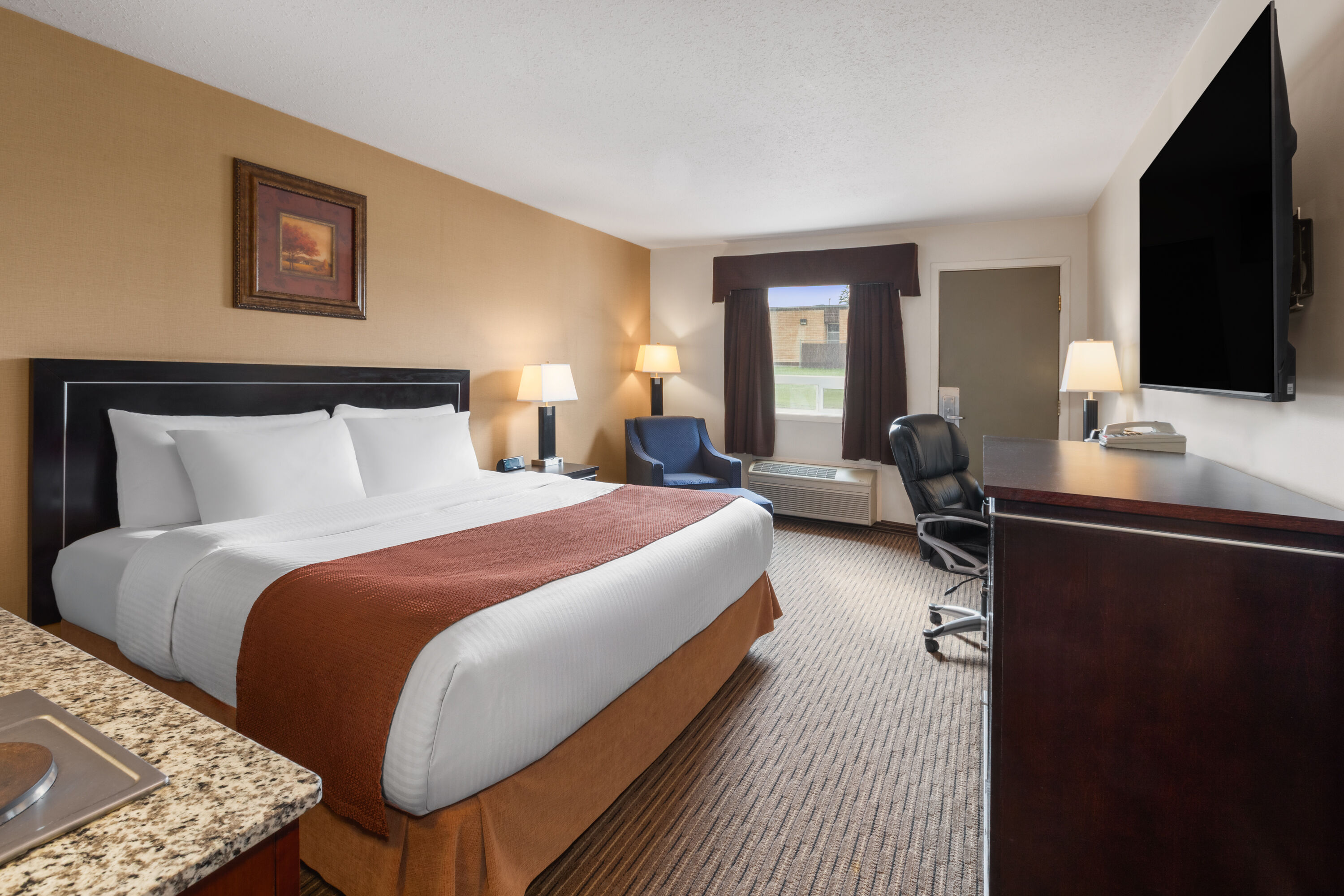 Guest room at the Travelodge by Wyndham Valleyview AB in Valleyview, Alberta