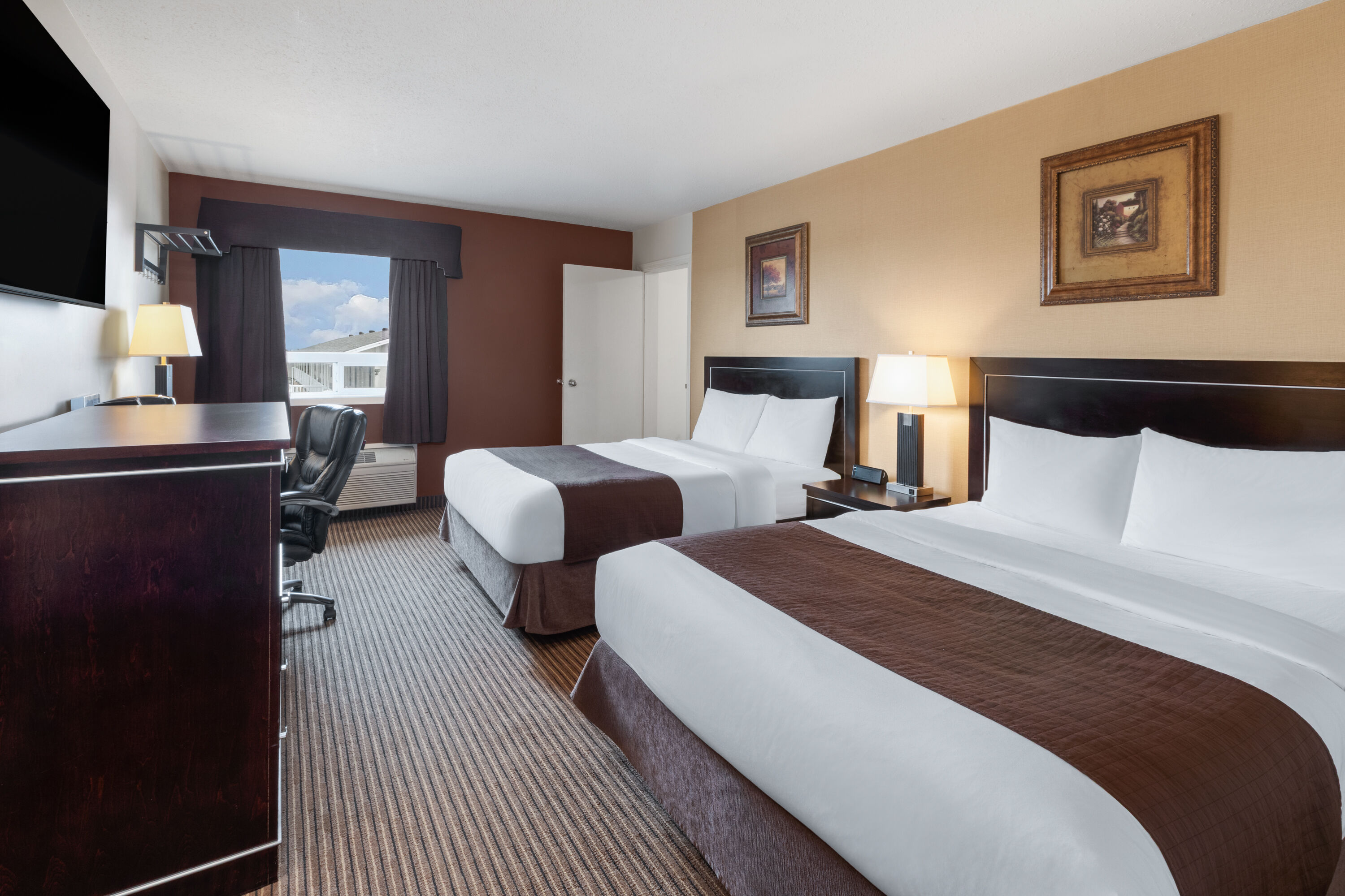 Guest room at the Travelodge by Wyndham Valleyview AB in Valleyview, Alberta