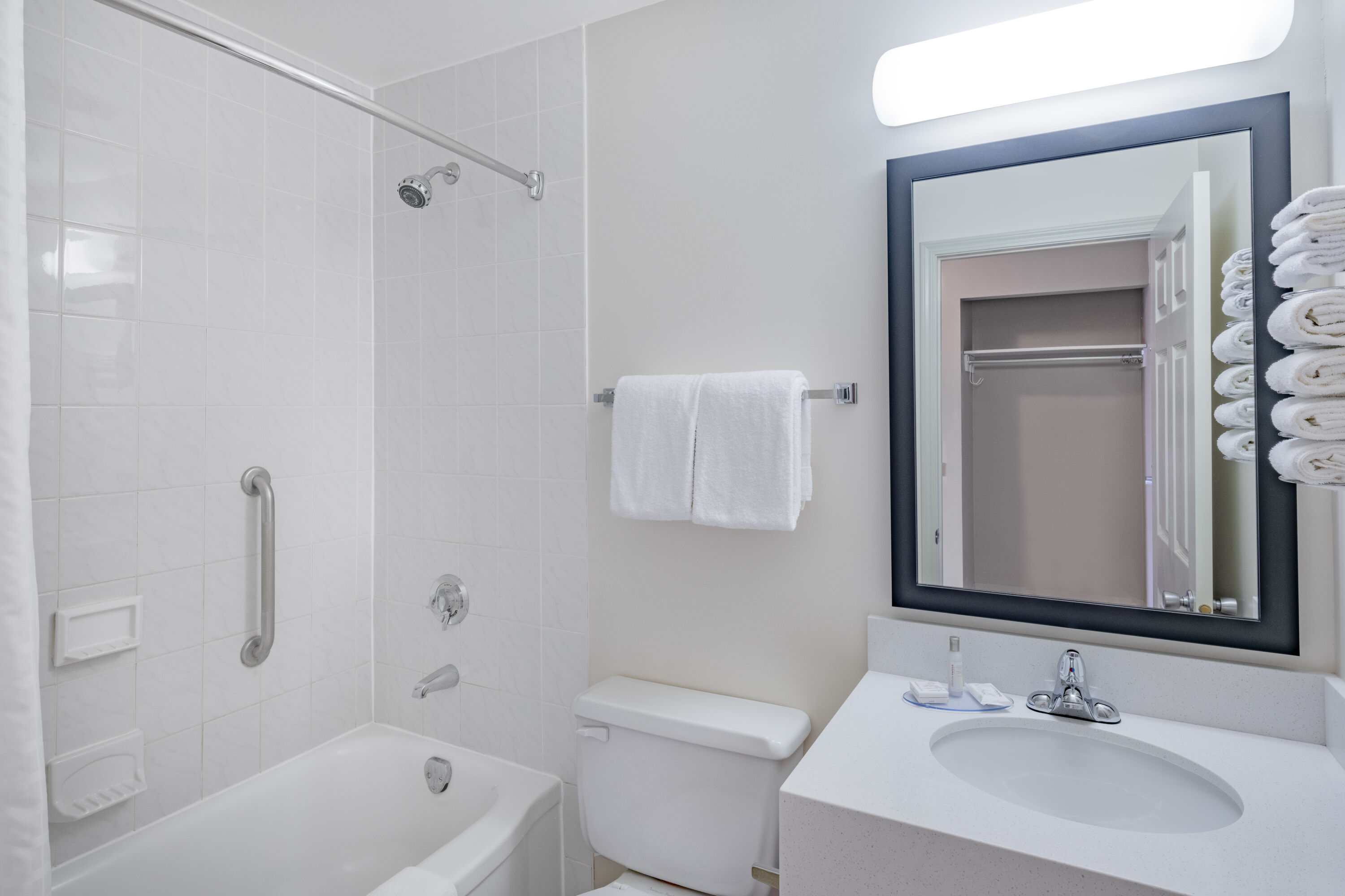 Guest room bath at the Travelodge by Wyndham Fort St John in Fort St. John, British Columbia