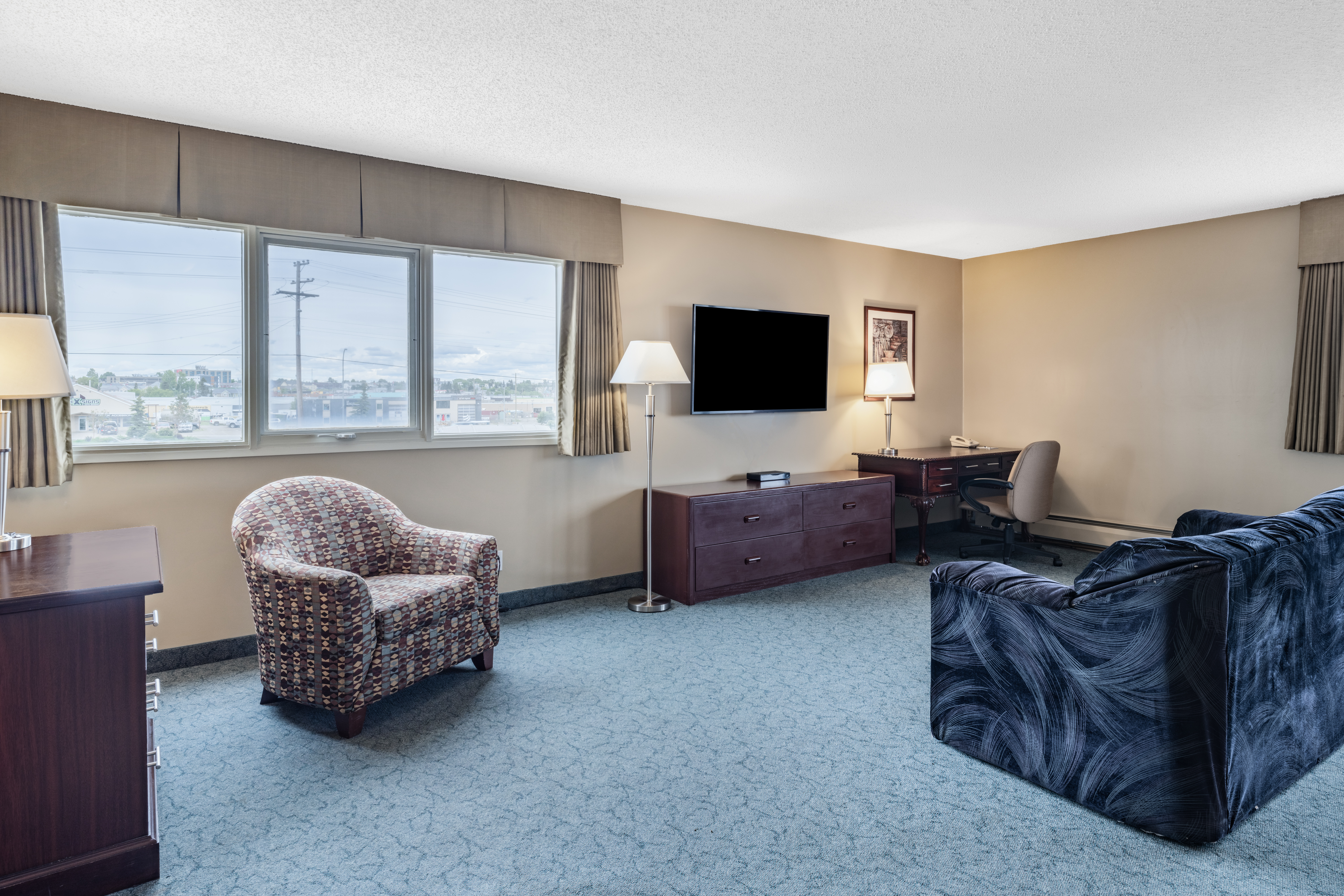 Guest room at the Travelodge by Wyndham Fort St John in Fort St. John, British Columbia