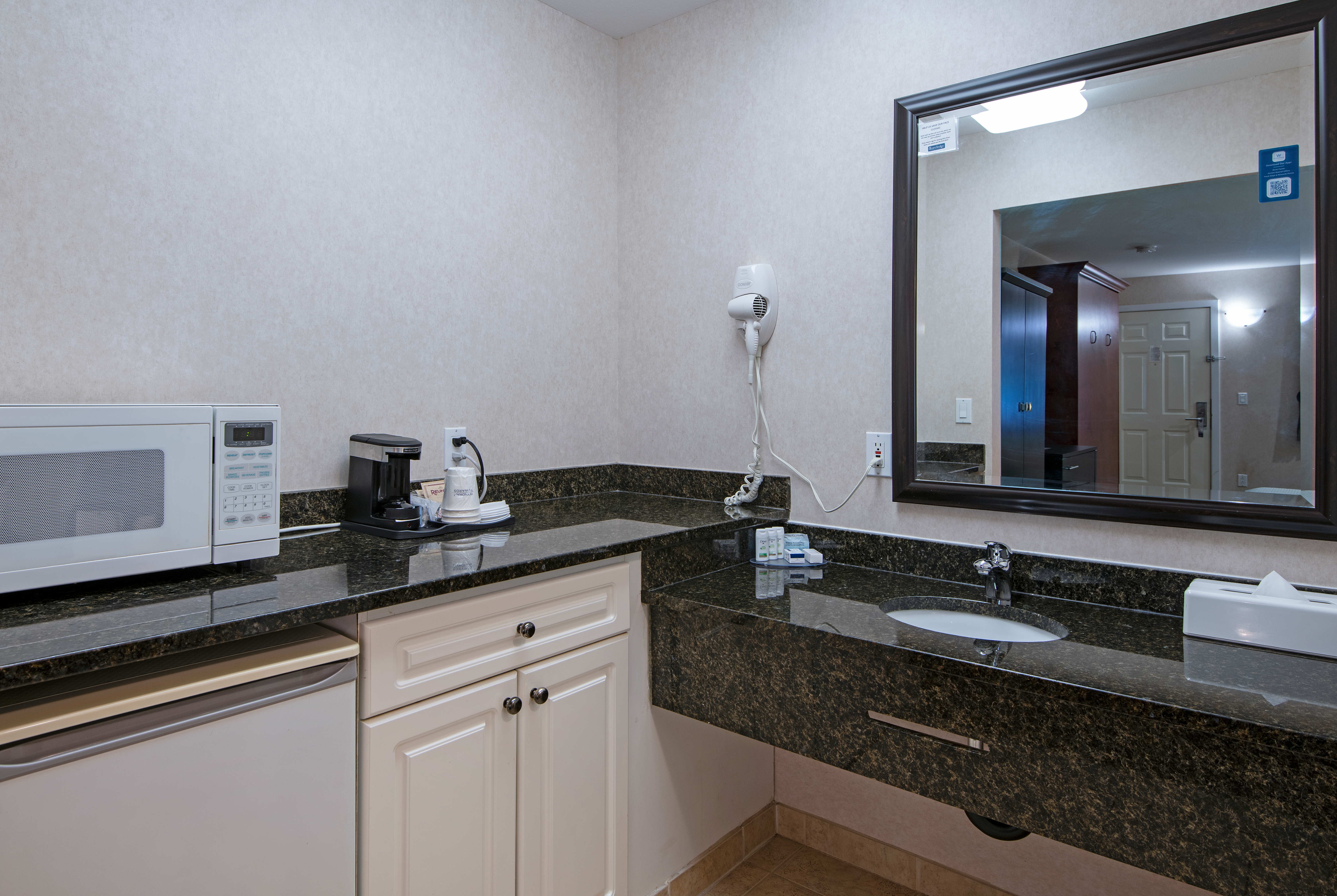 Guest room at the Travelodge by Wyndham Kamloops Mountview in Kamloops, British Columbia