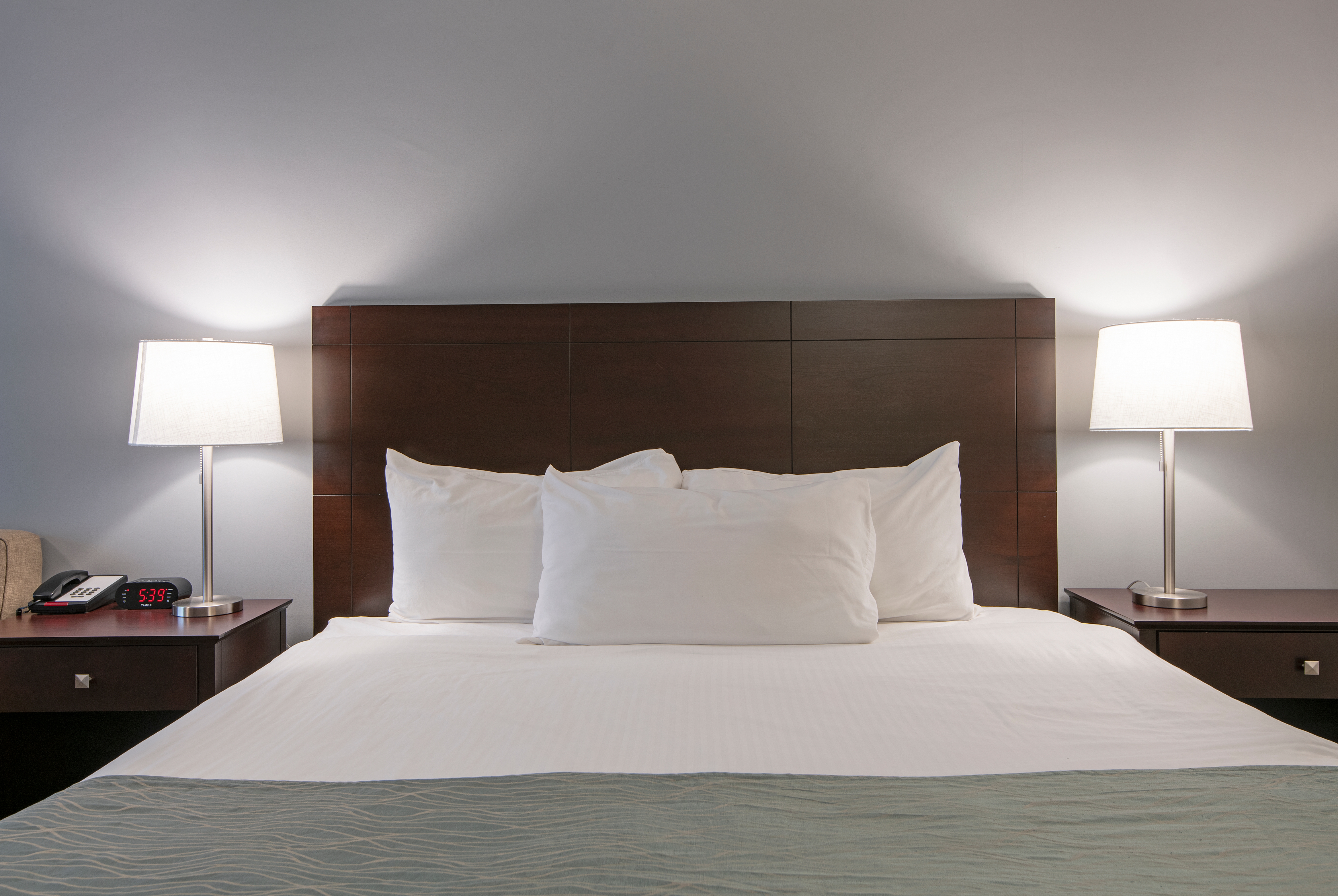 Guest room at the Travelodge by Wyndham Kamloops Mountview in Kamloops, British Columbia