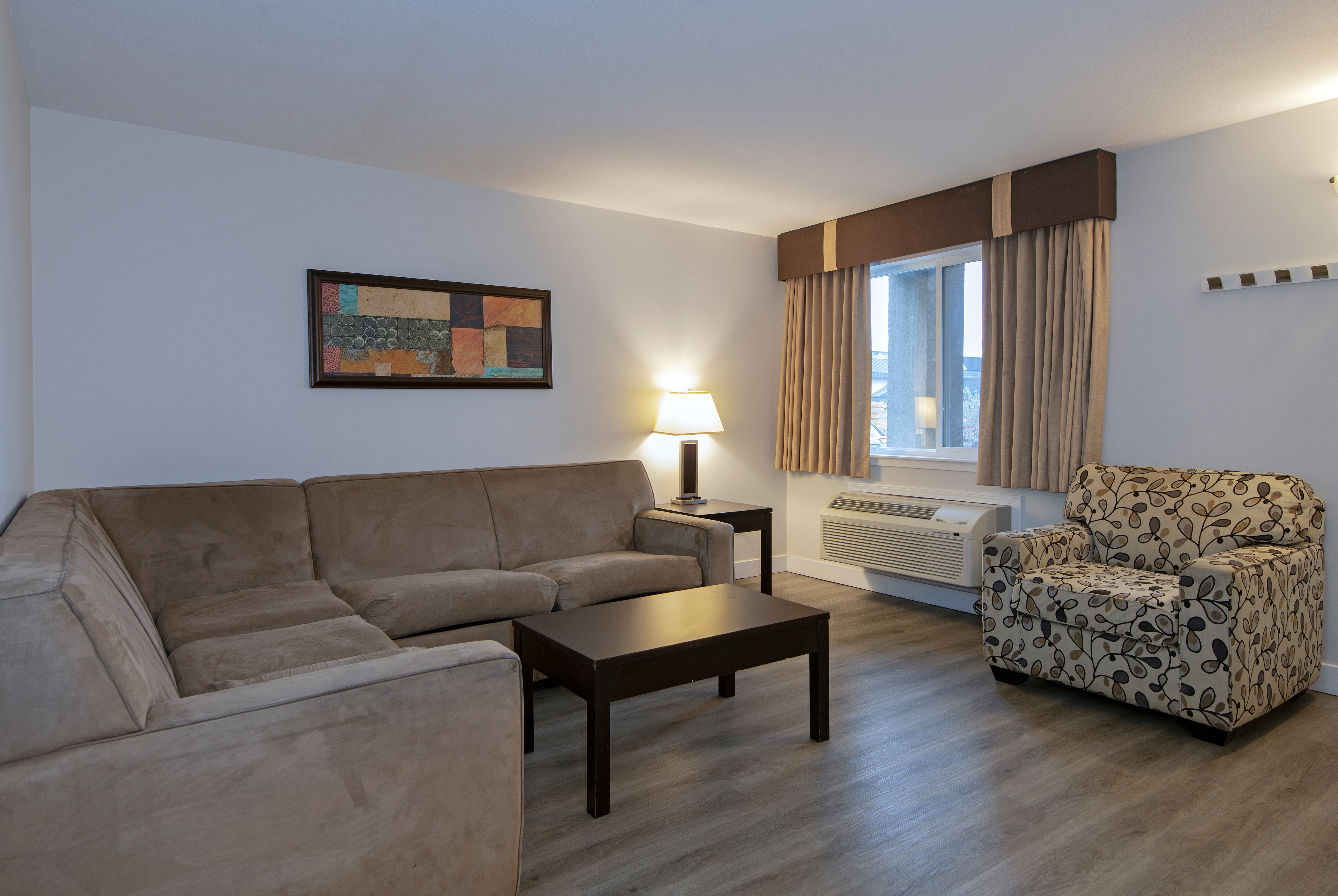 Guest room at the Travelodge by Wyndham Kamloops Mountview in Kamloops, British Columbia