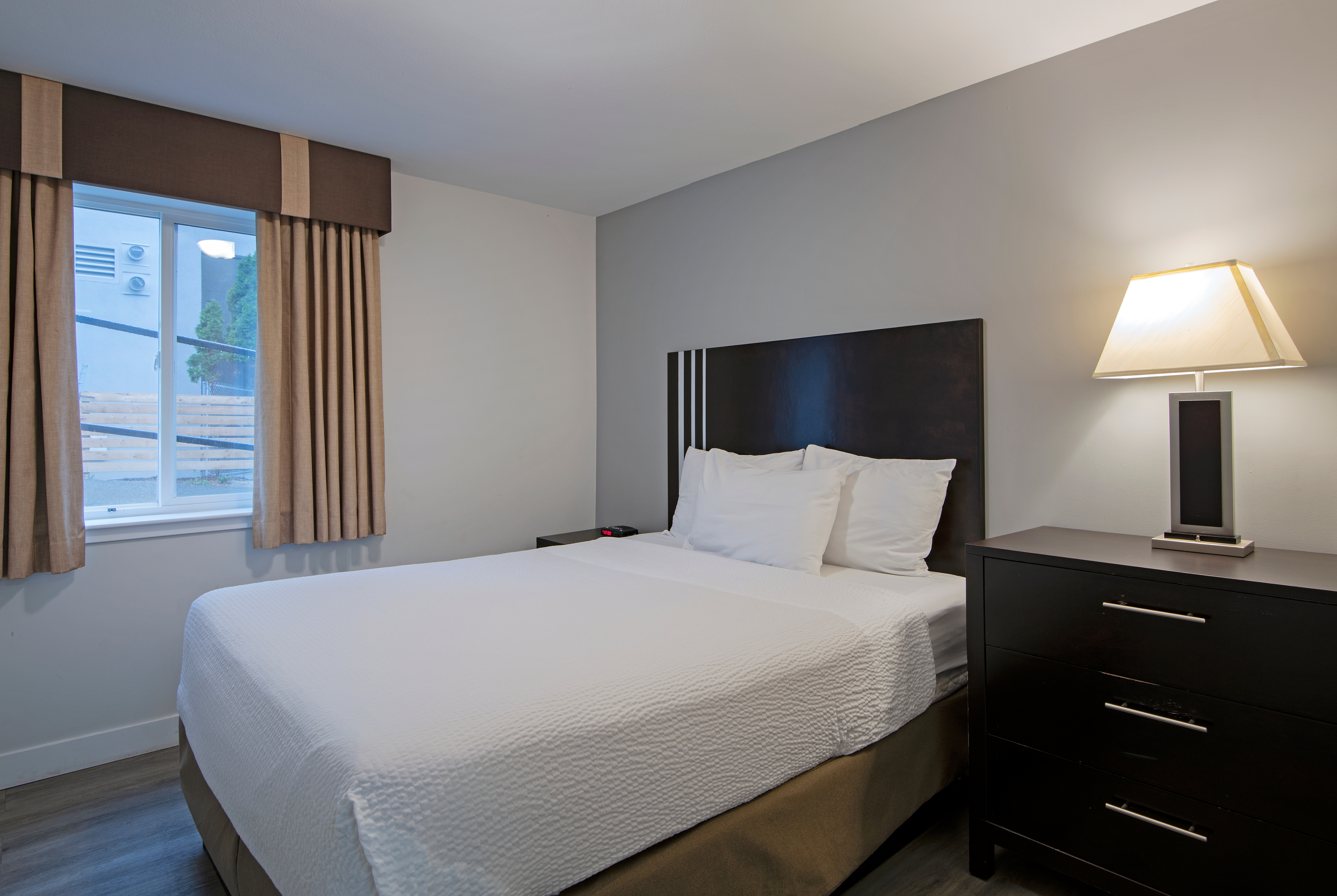 Guest room at the Travelodge by Wyndham Kamloops Mountview in Kamloops, British Columbia