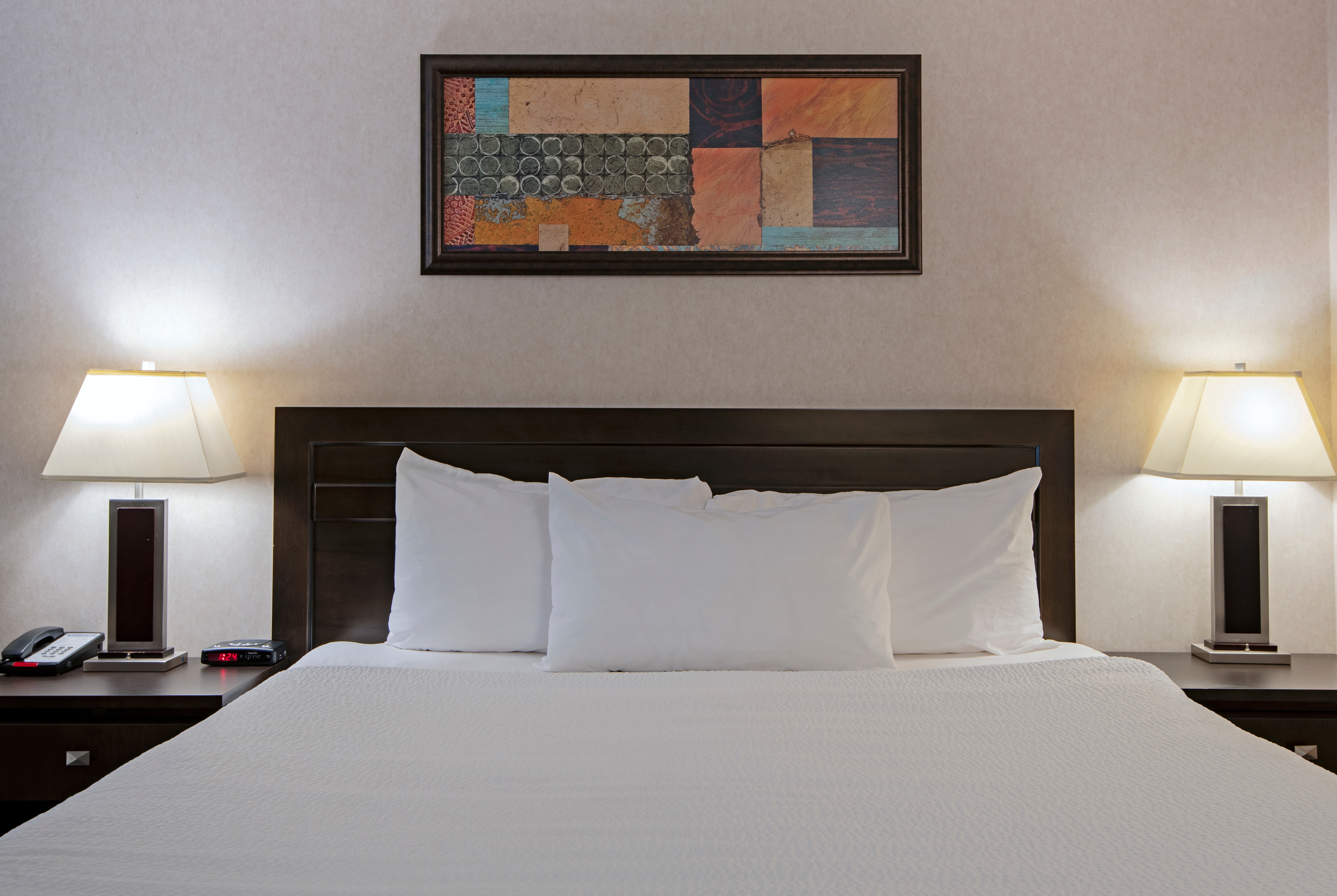 Guest room at the Travelodge by Wyndham Kamloops Mountview in Kamloops, British Columbia