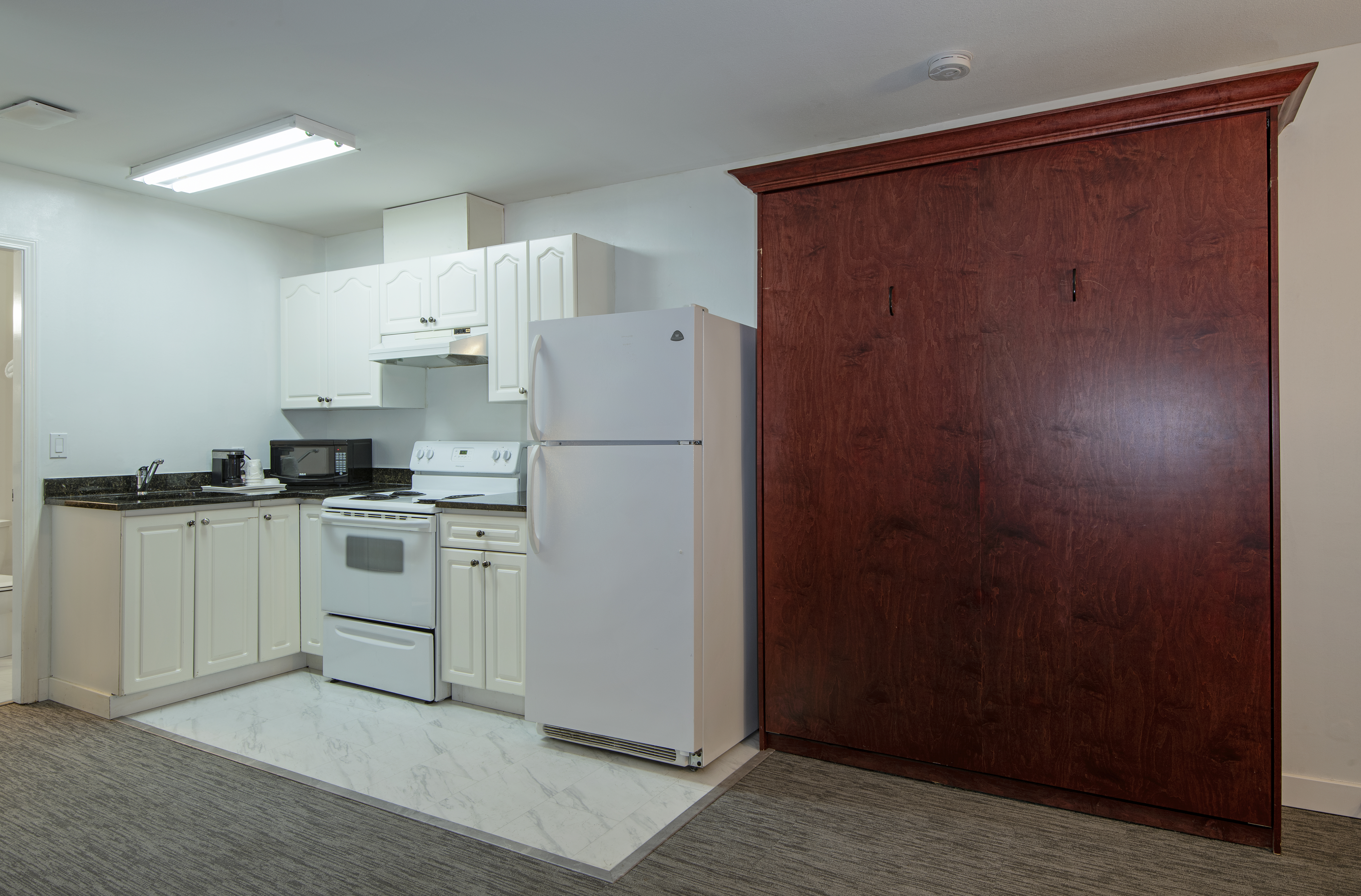 Guest room at the Travelodge by Wyndham Kamloops Mountview in Kamloops, British Columbia